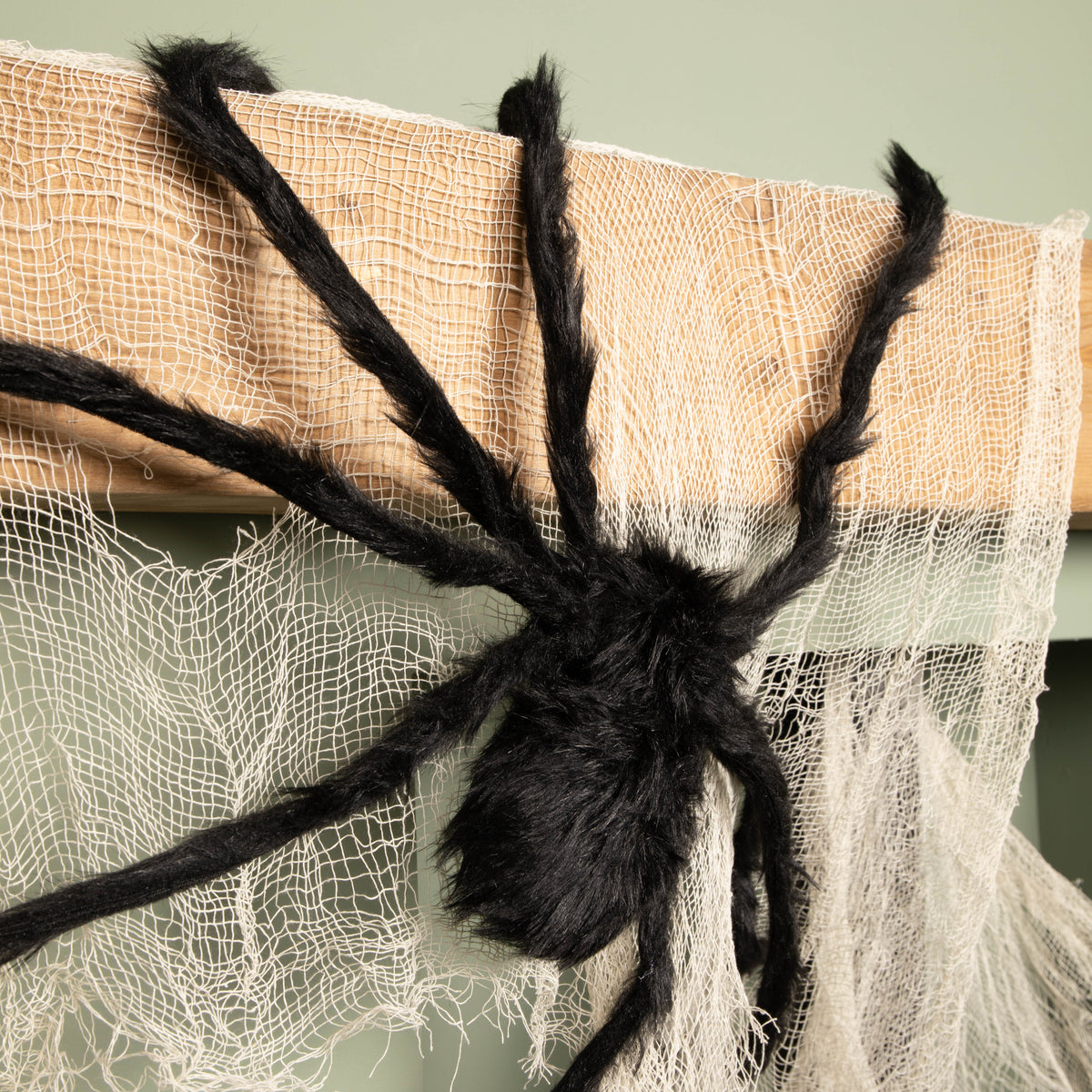 90cm Black Furry Halloween Spider Decoration with Extendable Legs and Red Eyes