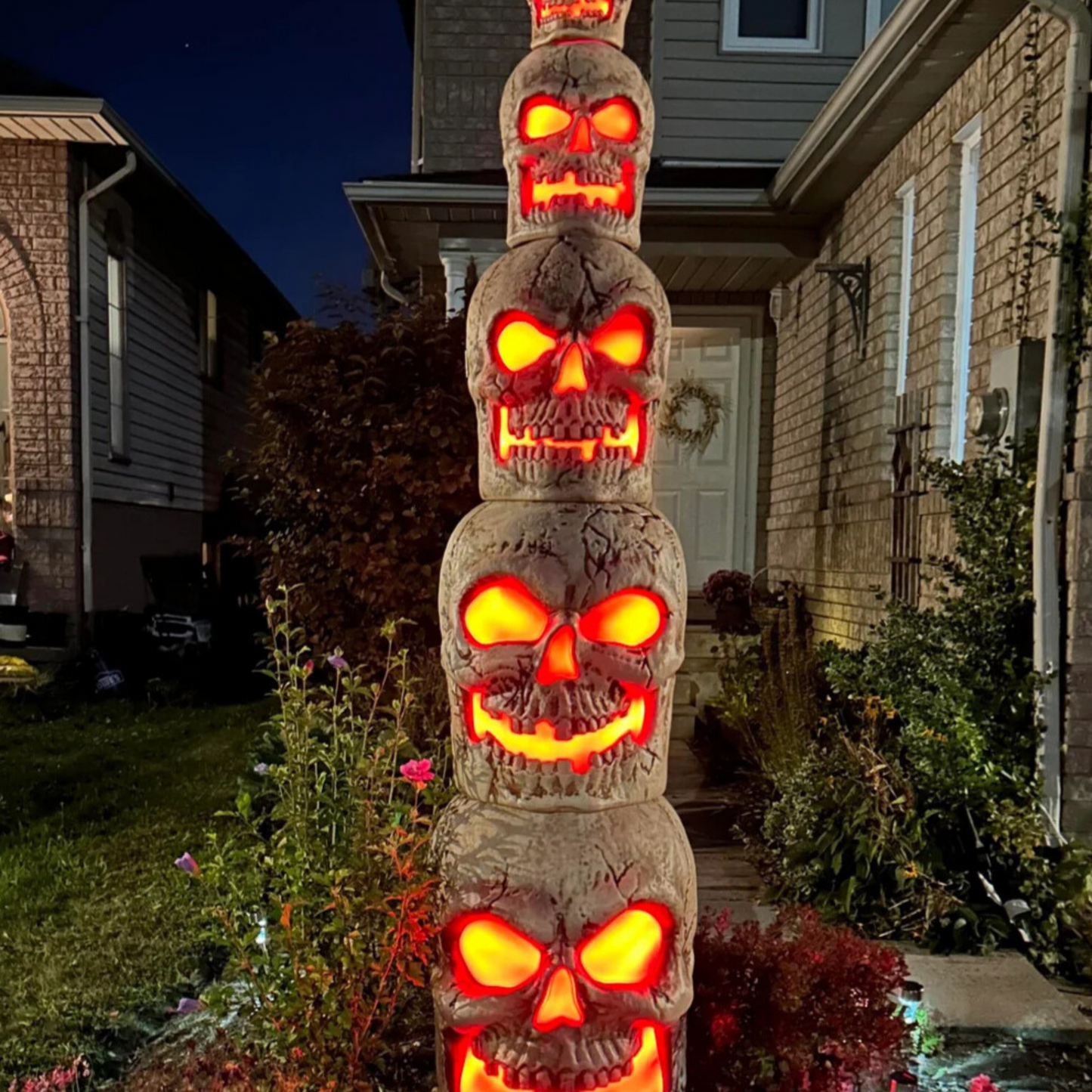 Home Accents Holiday 8ft Giant-Sized Halloween Skull Stack with Red LEDs