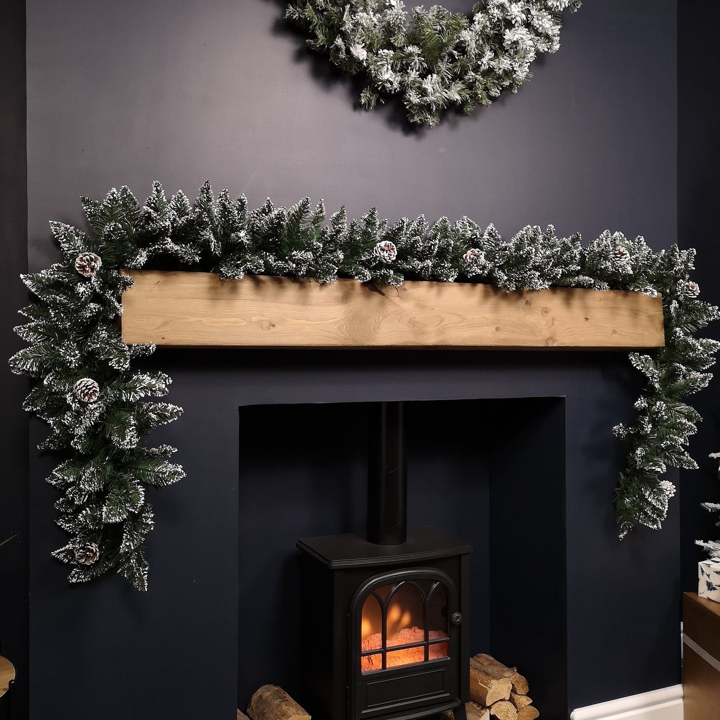 Premier Christmas Rocky Mountain Garland 2.7m Snow Flocked with Cones