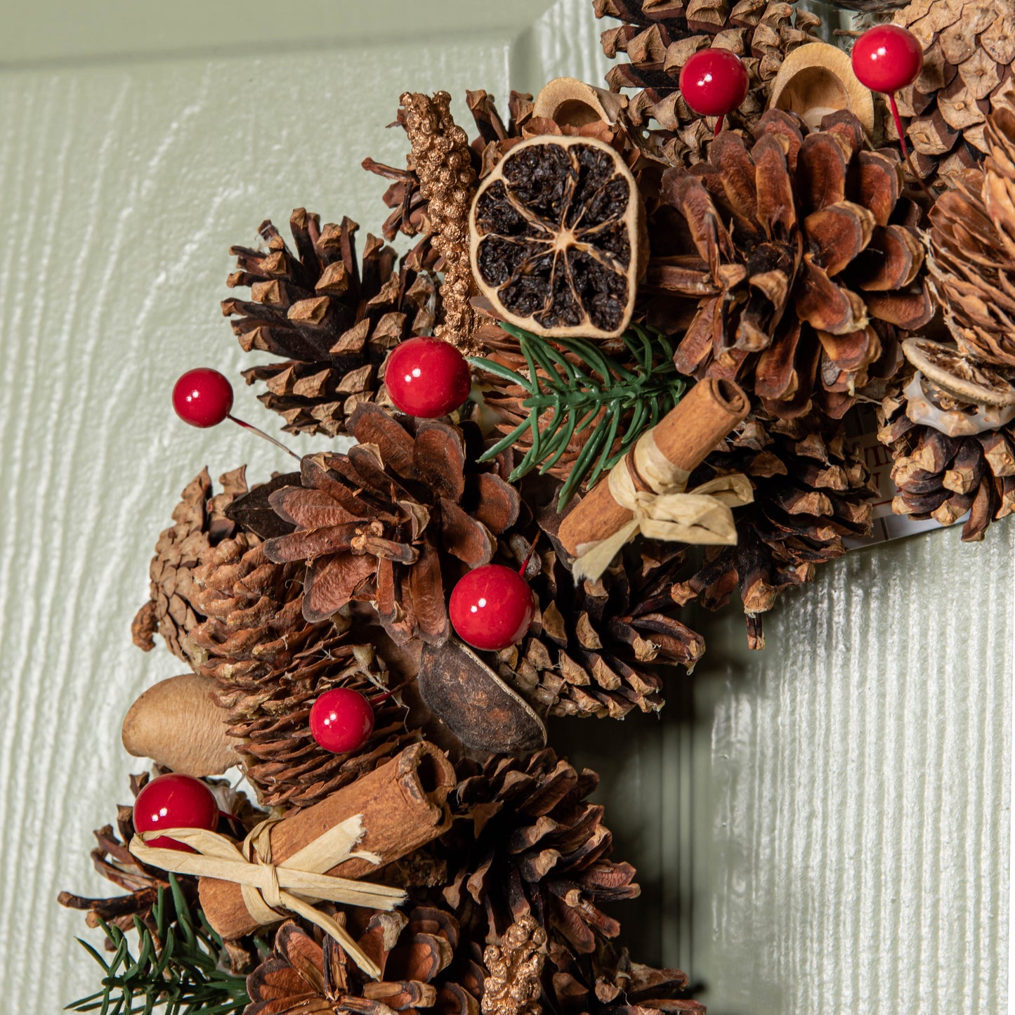 36cm Winter Spice Hanging Christmas Wreath with Pine Cones Red Berries & Dried Fruit