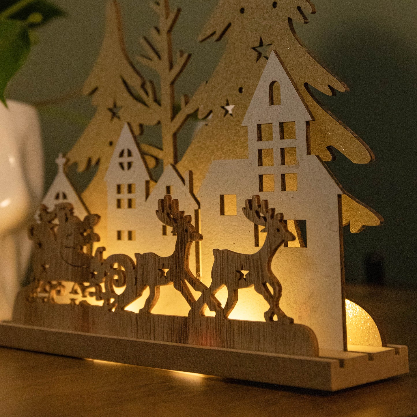 20cm Battery Operated Light up Wooden Village with Santa in Sleigh and Warm White LEDs