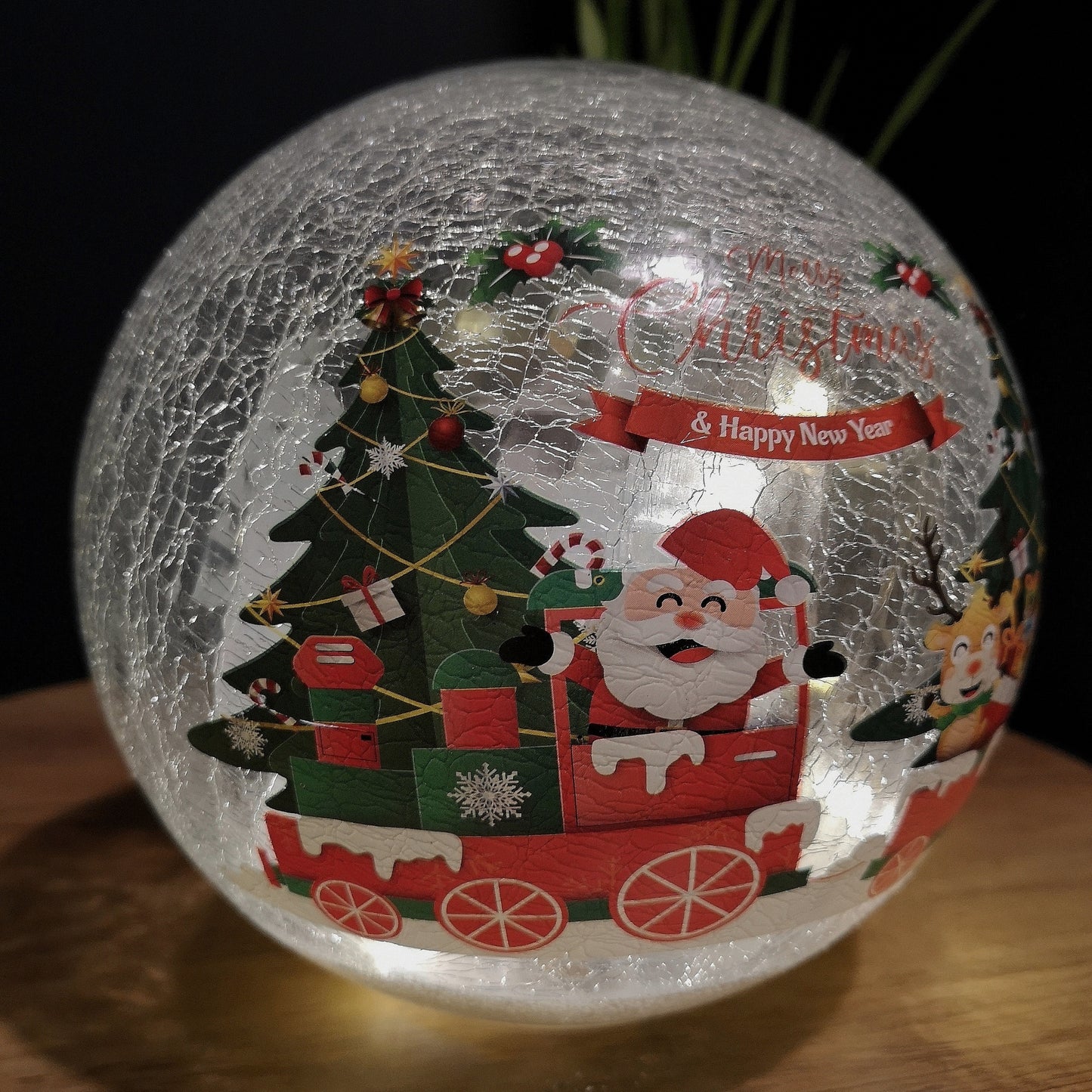 20cm Battery Operated Twinkling Warm White LED Crackle Effect Ball Christmas Decoration with Santa and Friends in Train