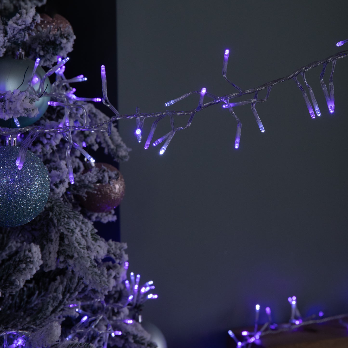 9.3m 720 LED Christmas Cluster String Lights with Timer in Blue, Purple & White on Clear Cable