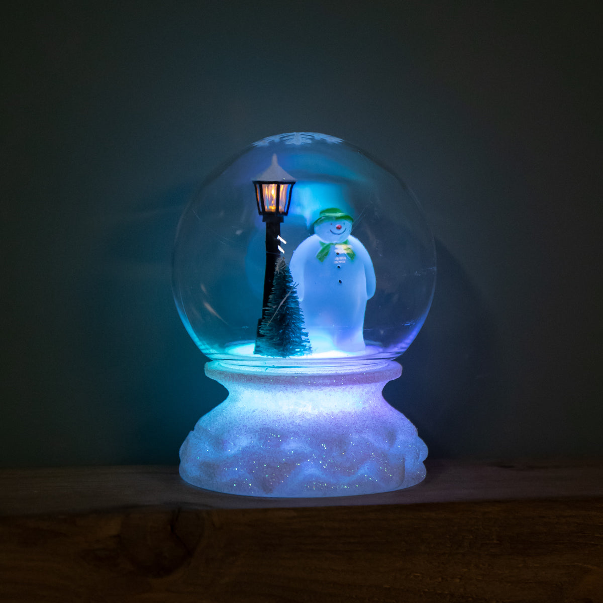 12cm Battery Operated Light up Christmas Snow Globe with The Snowman & Multi-Coloured LEDs