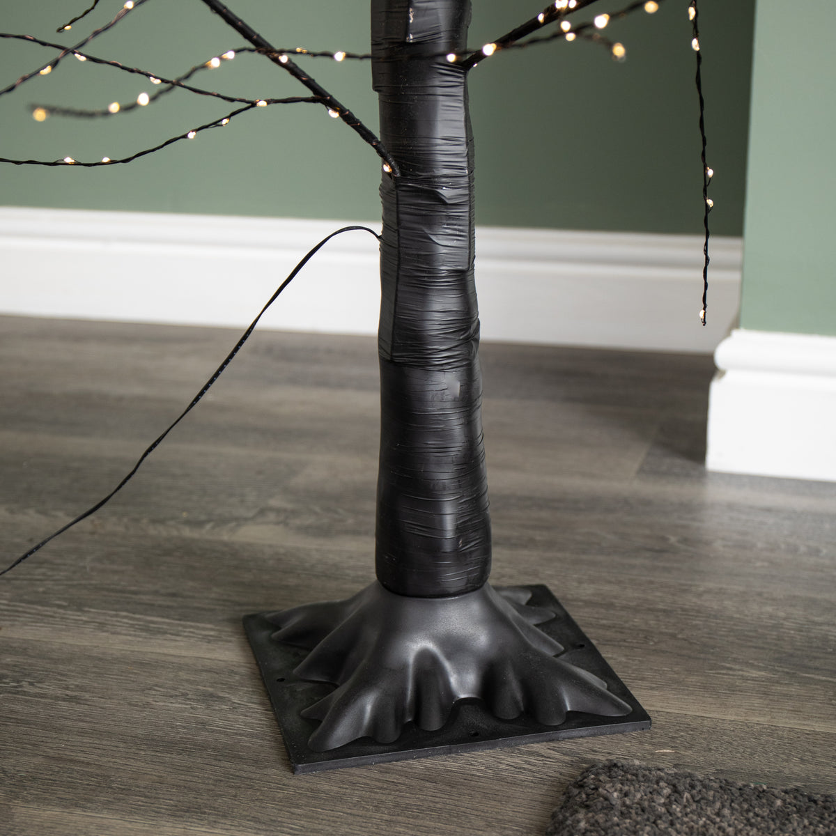 6ft (1.8m) Tall Light up Black Micro Dot Christmas Tree with 1100 Warm White LEDs and Remote Control