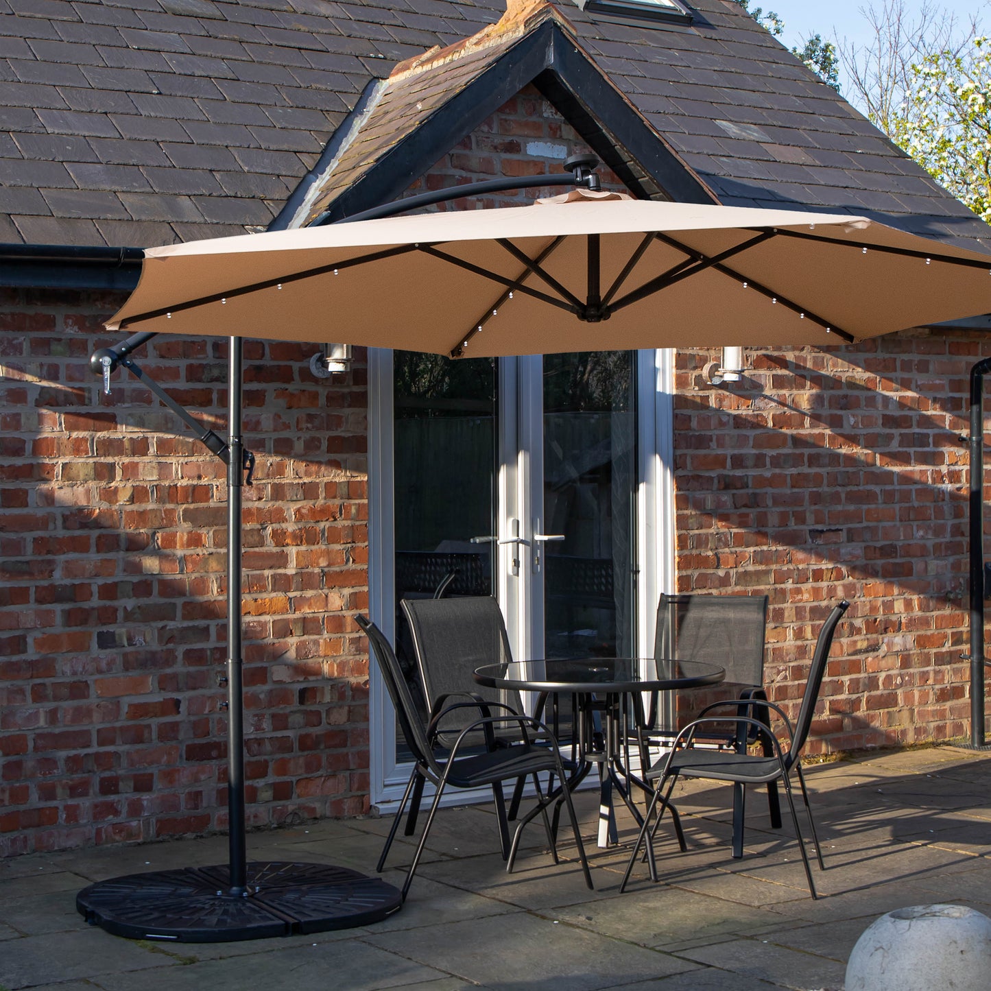 Outdoor 4 Person Round Glass Top Garden Dining Table Chairs With Beige Banana Lit Parasol and Base
