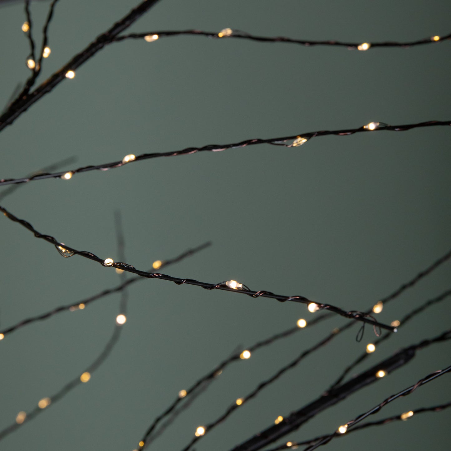 7ft (2.10m) Tall Light up Black Micro Dot Christmas Tree with 1600 Warm White LEDs