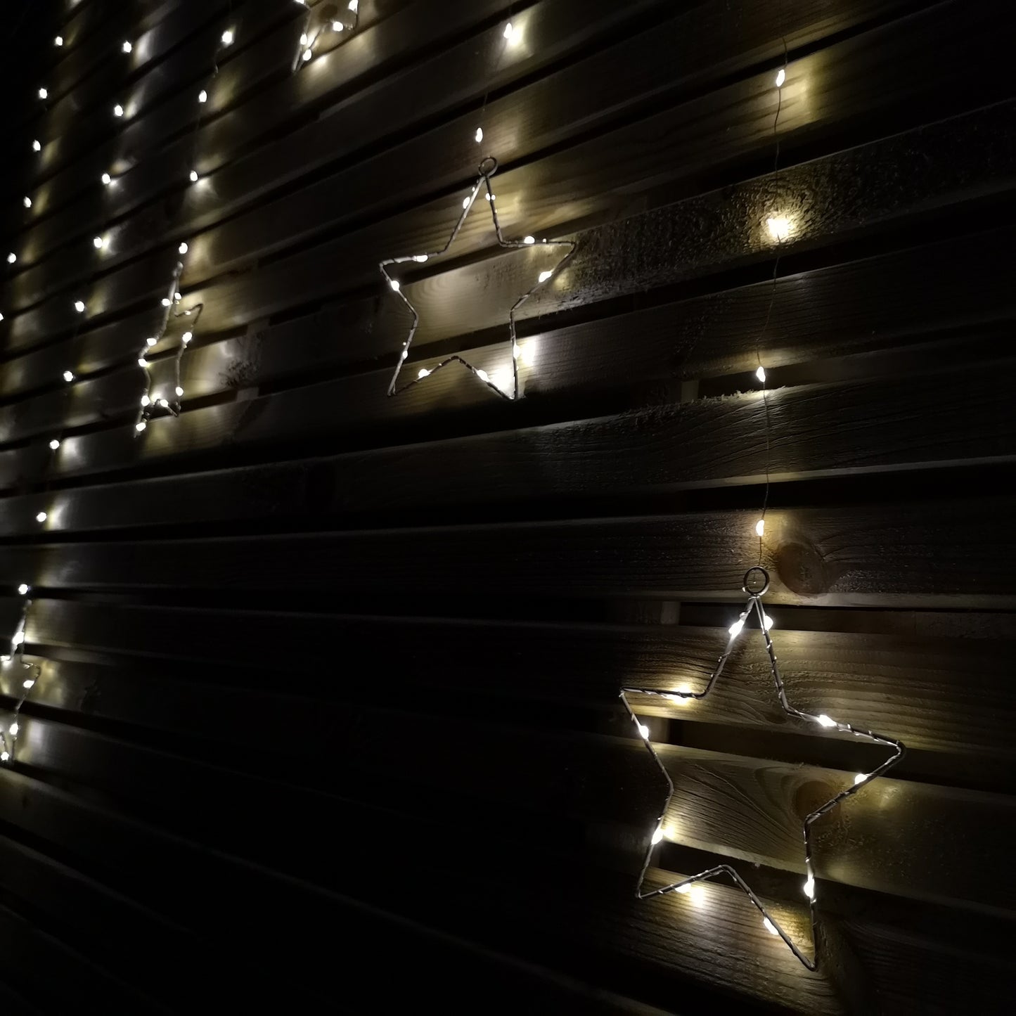 1.2m Battery Operated Christmas Star Curtain Lights with 140 Warm White LEDs