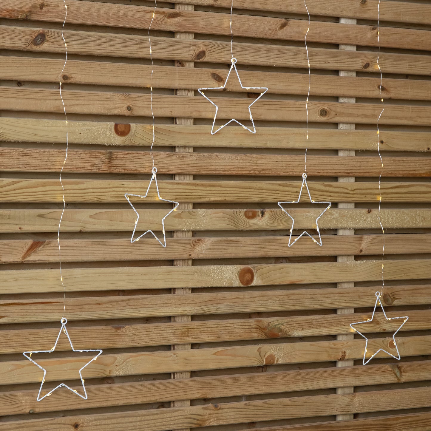 1.2m Battery Operated Star Christmas Curtain Lights with 140 Warm White LEDs