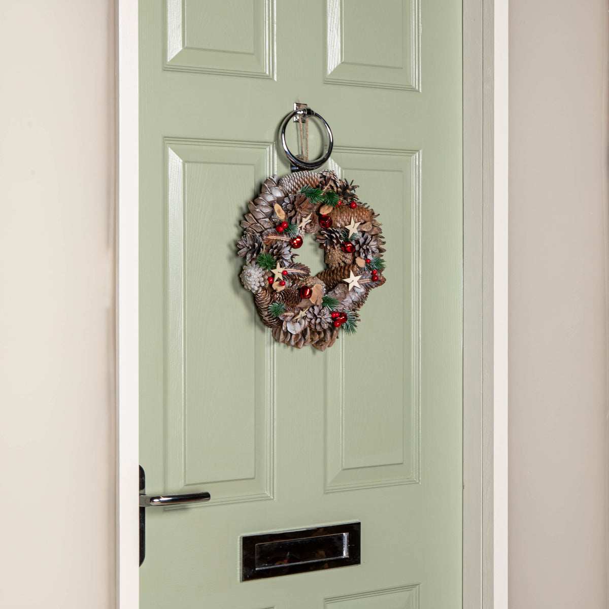 30cm Hanging Christmas Wreath with Red Jingle Bells, Berries and Frosted Stars