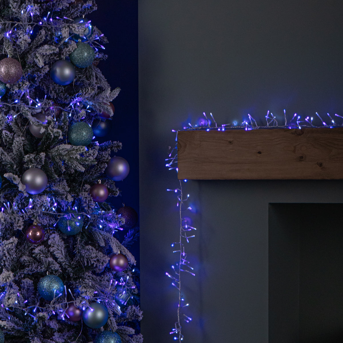 12.4m 960 LED Christmas Cluster Multi-Action String Lights with Timer in Blue, Purple & White on Clear Cable