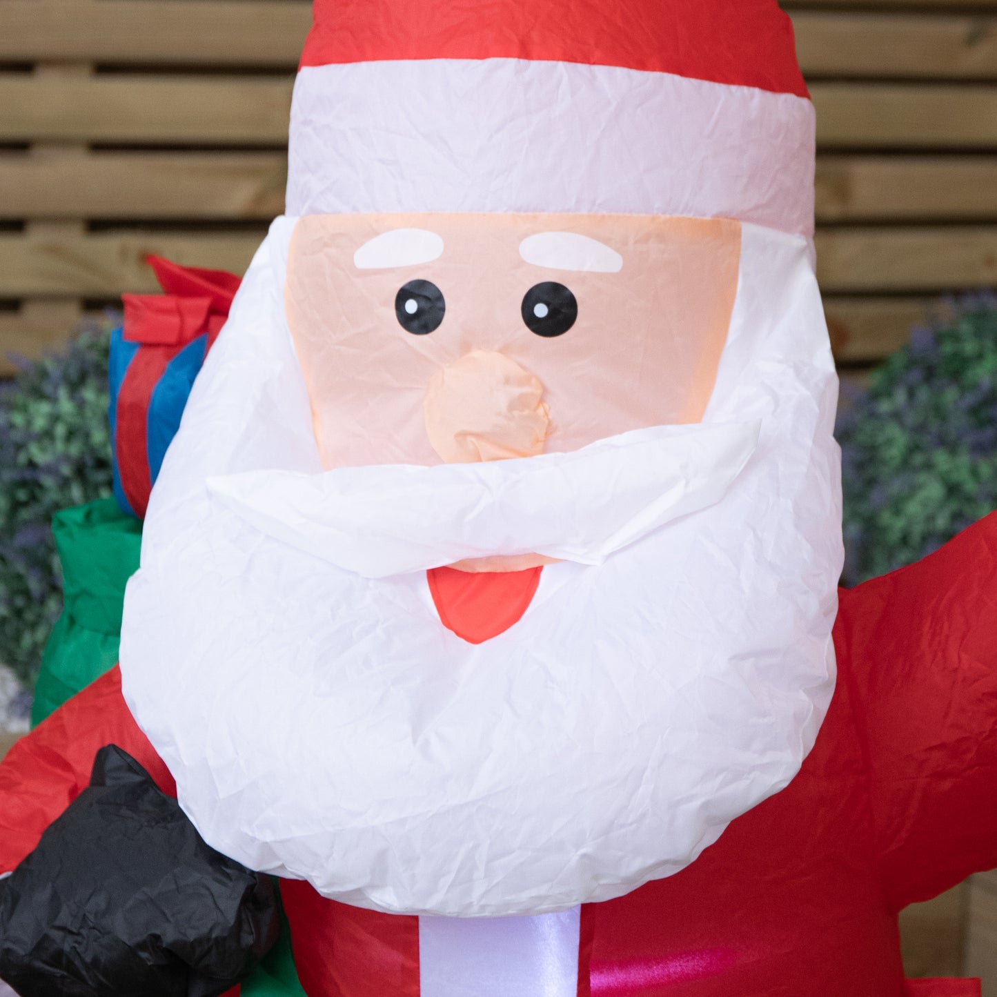130cm (4ft) Inflatable LED Outdoor Christmas Standing Santa with Gift in Sack