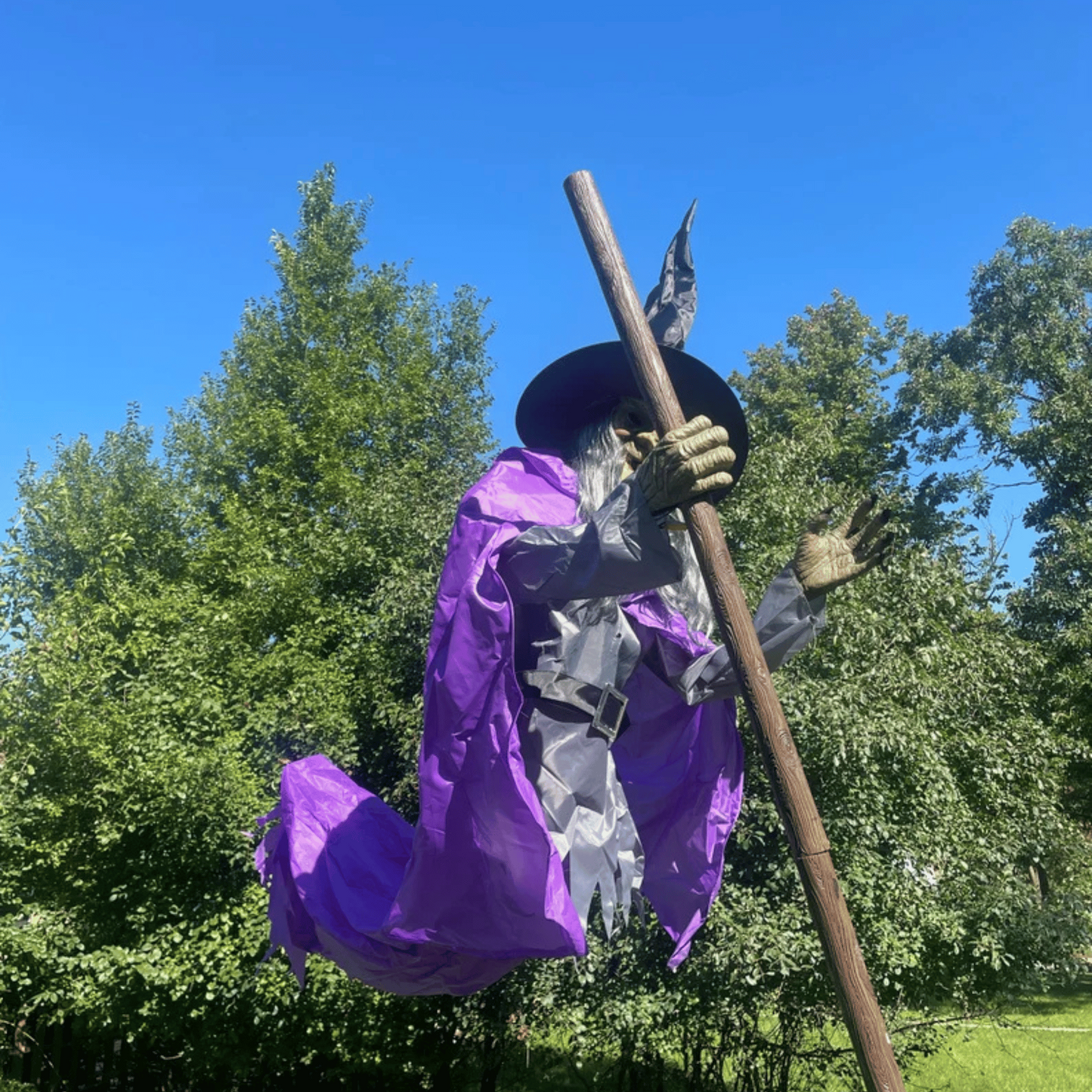 Home Accents Holiday 12ft Giant Animated Hovering Halloween Witch with Broomstick and LEDs