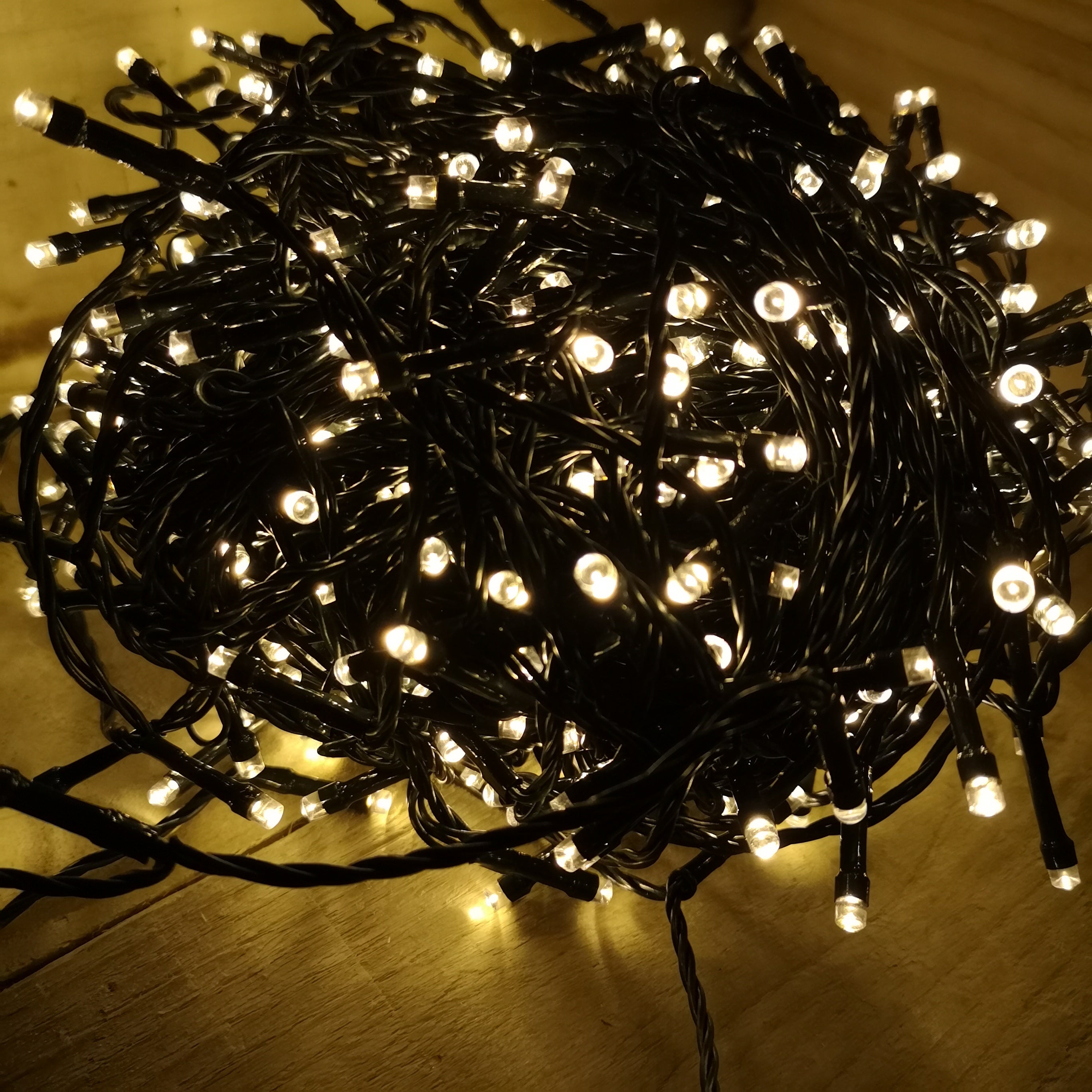 600 LED 60m Premier Christmas Indoor Outdoor Multi Function Battery Operated String Lights with Timer in Warm White