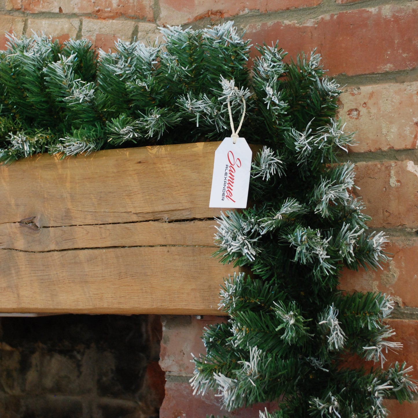 270cm (9ft) x 25cm Snow Tipped Green Christmas Garland Decoration