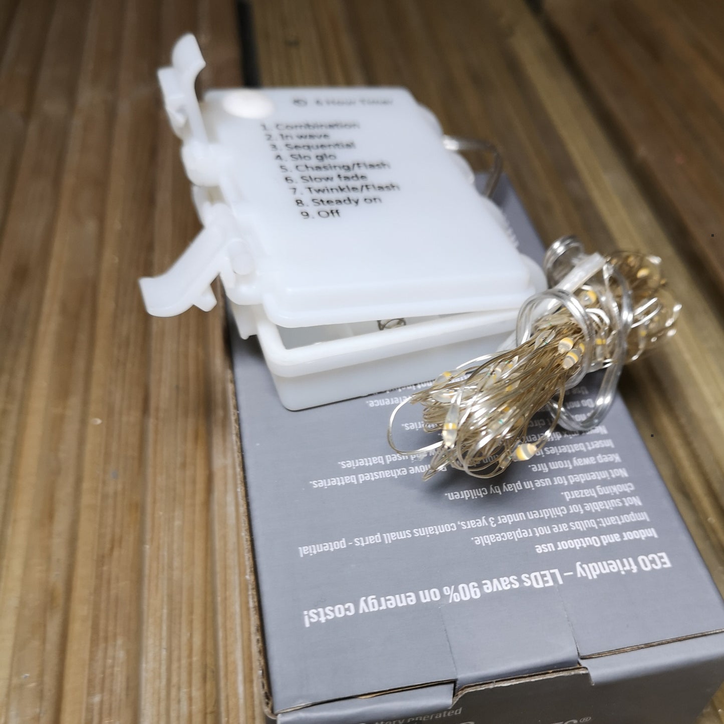 200 LED 10m Premier MicroBrights Indoor Outdoor Christmas Multi Function Battery Operated Lights with Timer on Pin Wire in Warm White