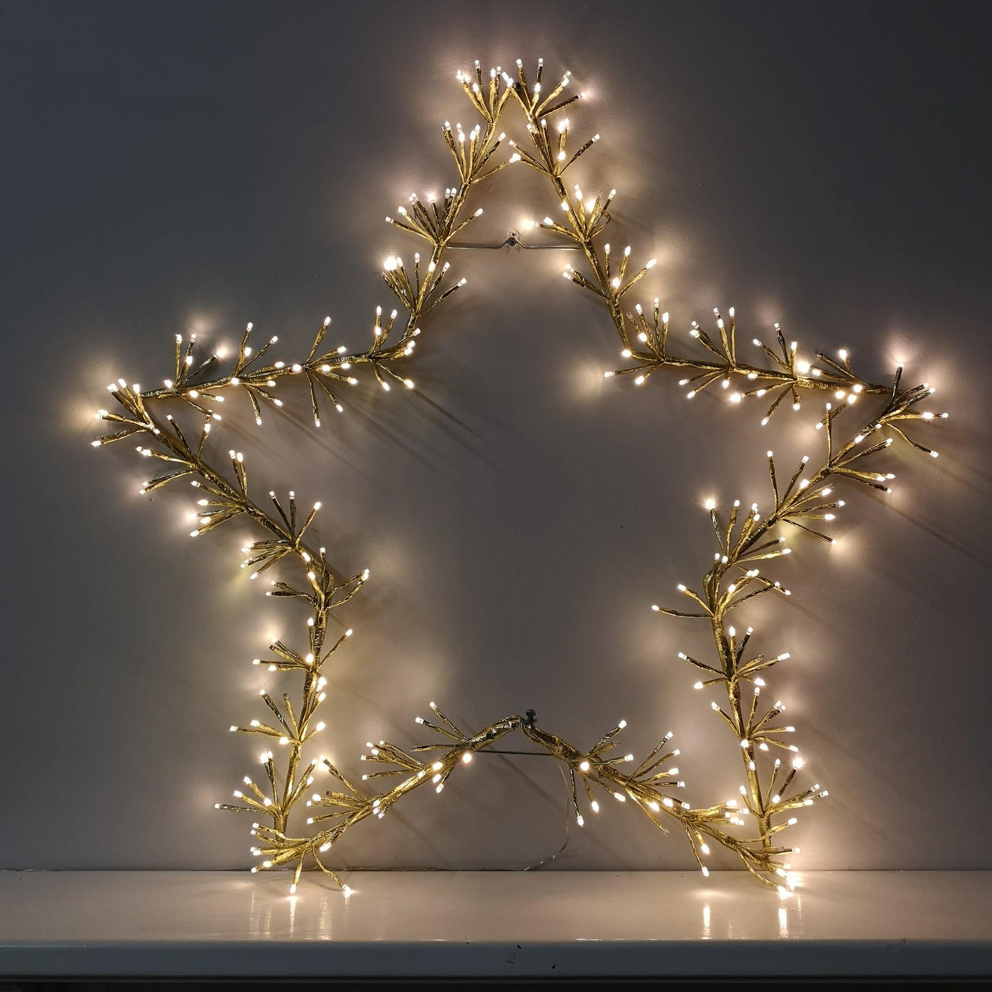 90cm Premier Twinkling LED Gold Star Silhouette Christmas Decoration in Warm White