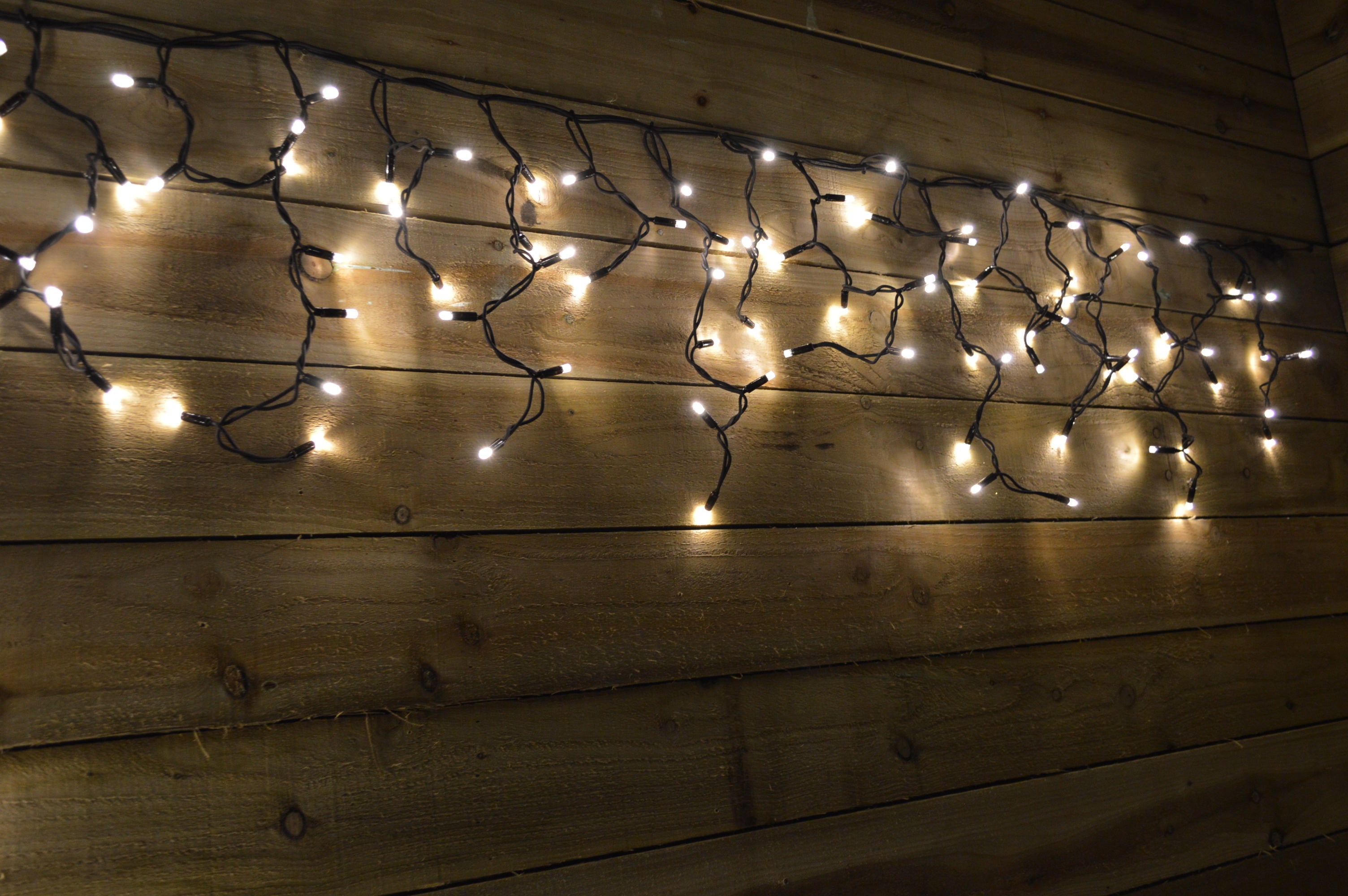300 LED (6m) Warm White Connectable Icicle Lights on a Black Cable