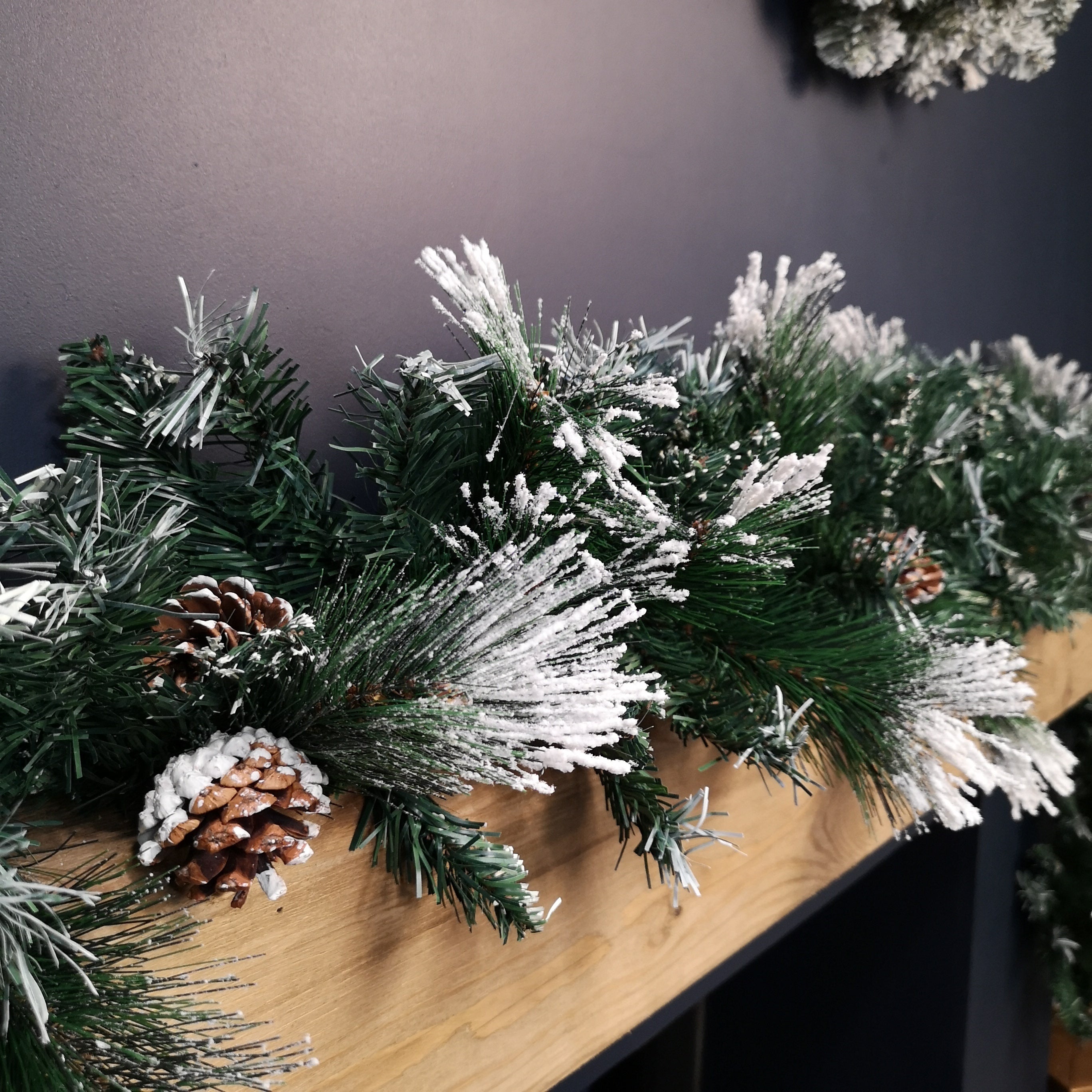 2.7m Snow Flocked Christmas Garland with Pine Cones and Mixed Needles