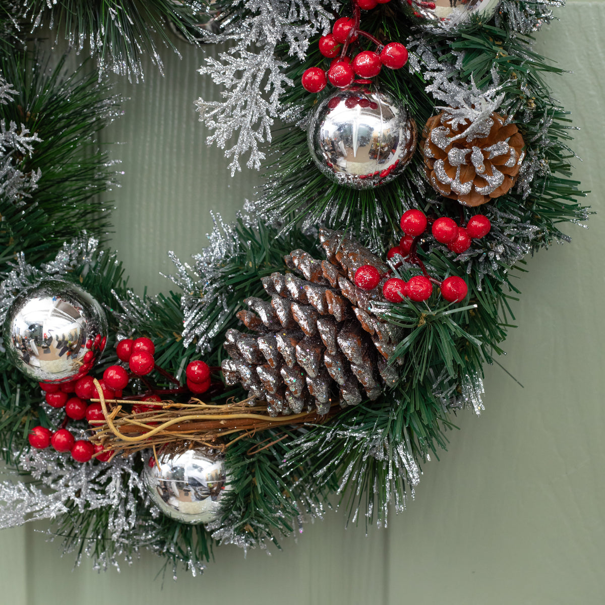 The Tree Company 40cm Festive Silver Dressed Christmas Wreath With Pinecones and Red Berries