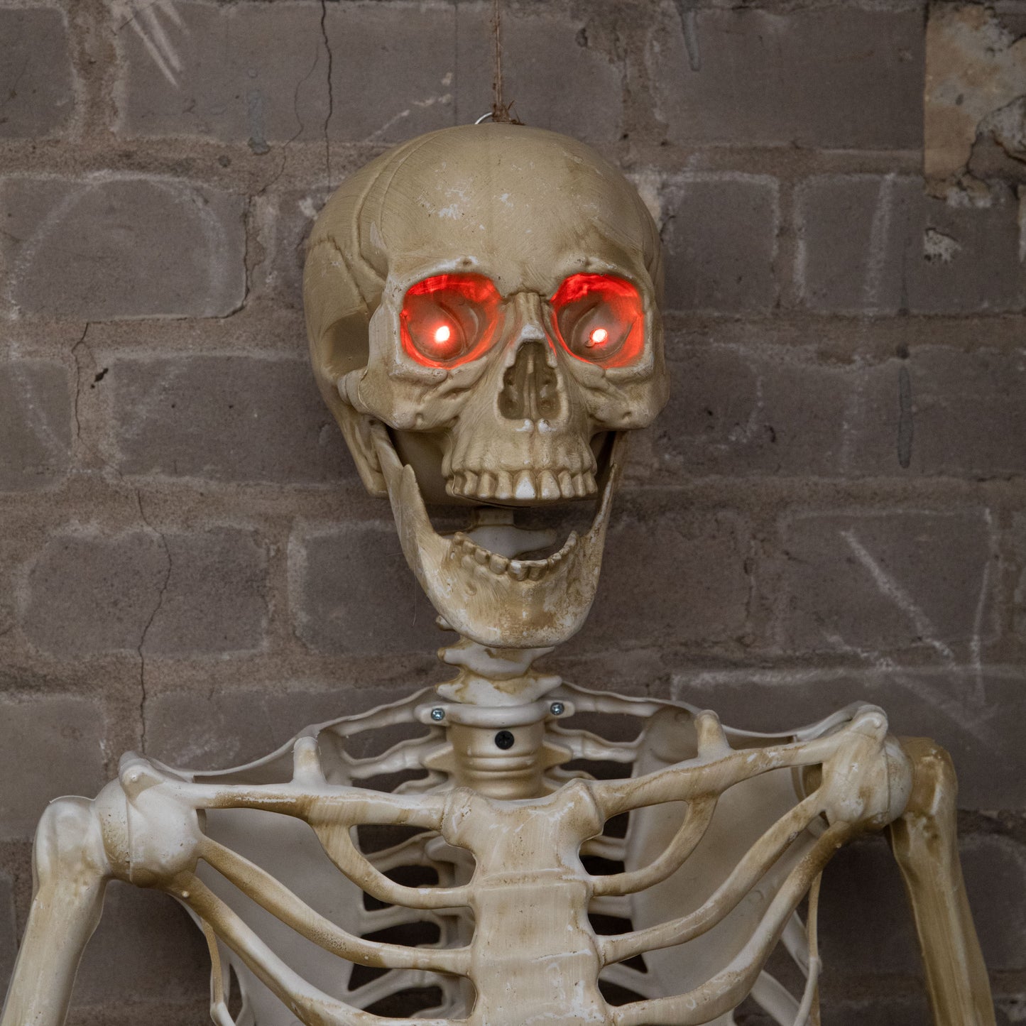 5ft (1.5m) Battery Powered Light up Halloween Skeleton with Poseable Joints & Red LEDs