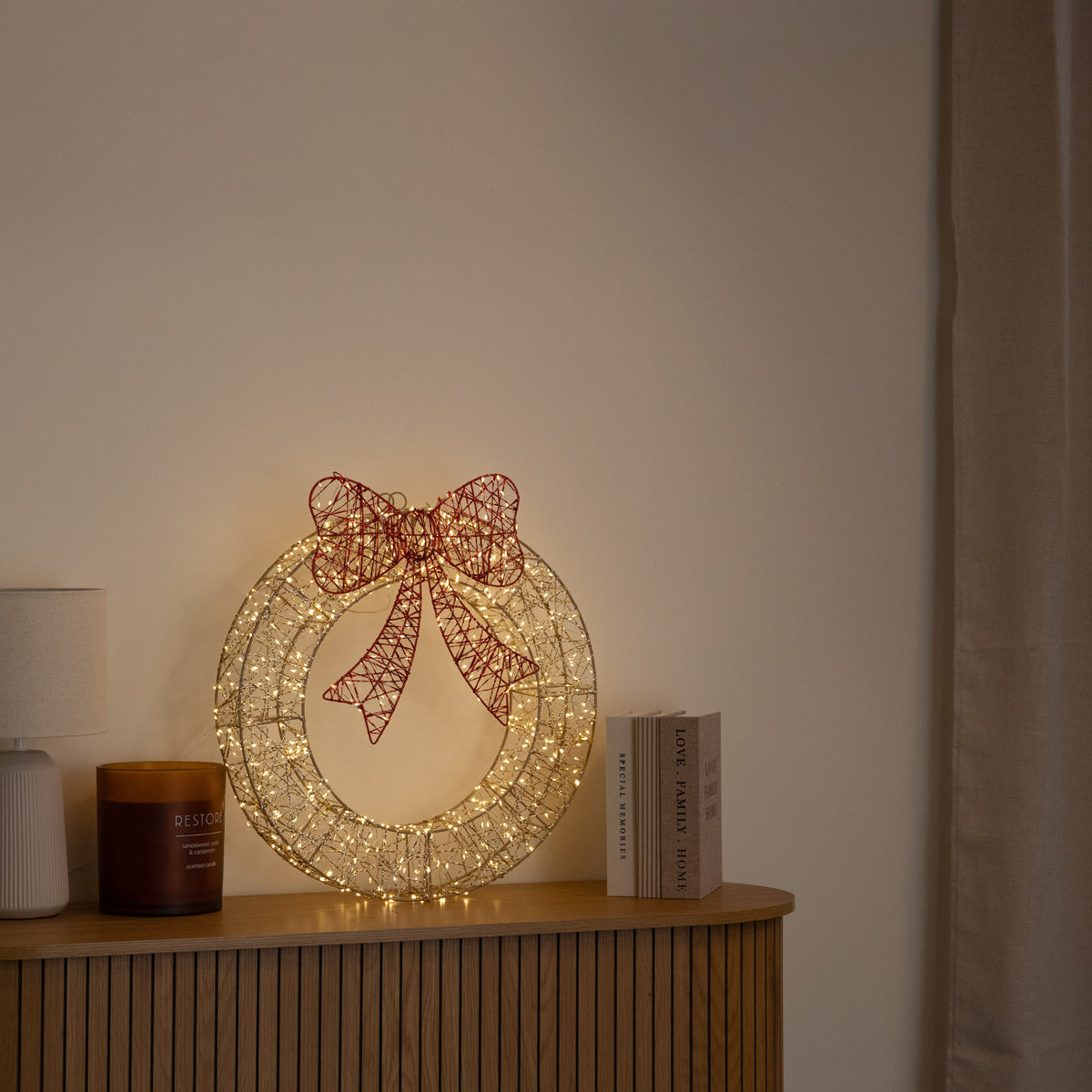50cm Gold Light Up Christmas Wreath with 600 Warm White LEDs, Timer & Red Bow