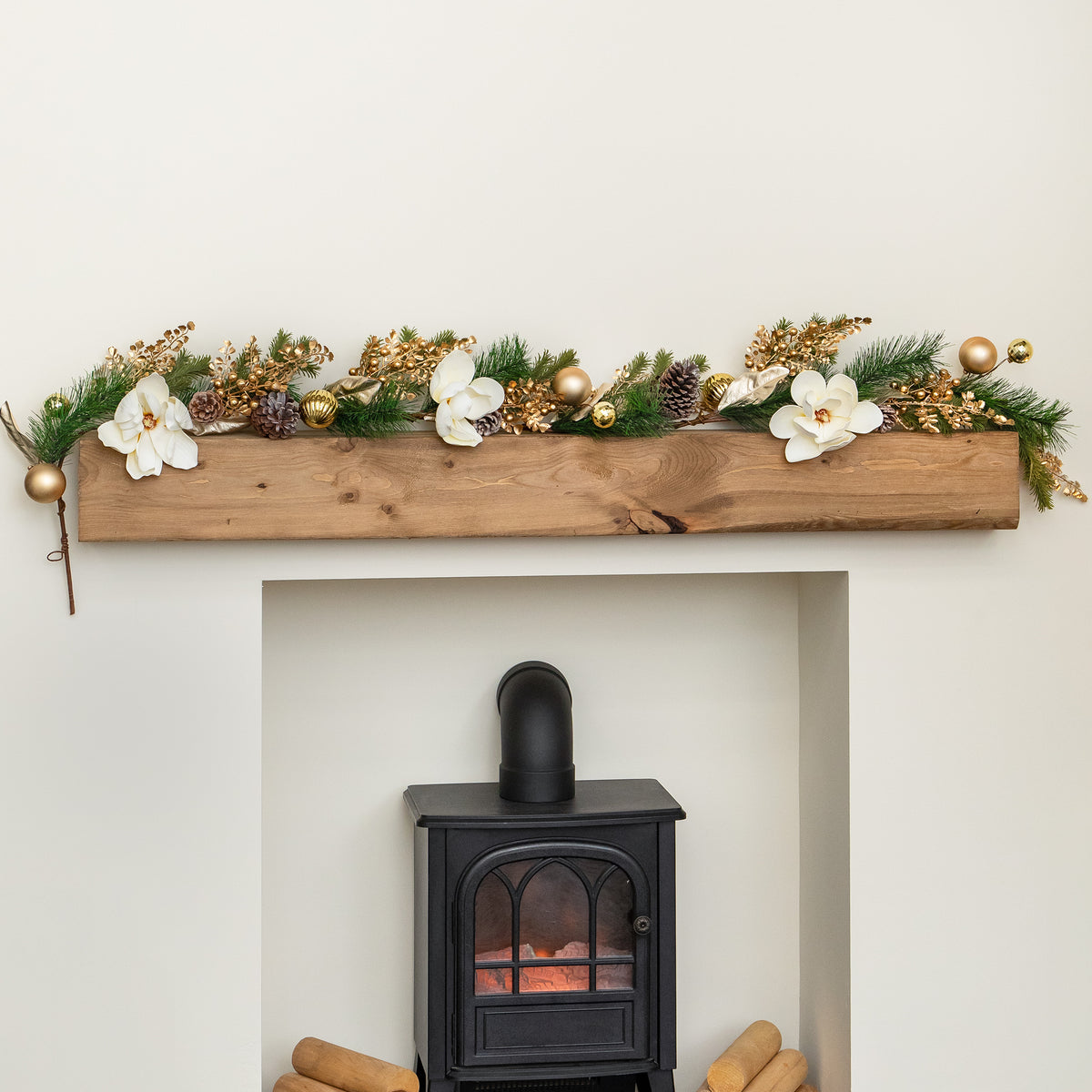 1.8m Champagne Magnolia Decorated Christmas Garland with Gold Baubles