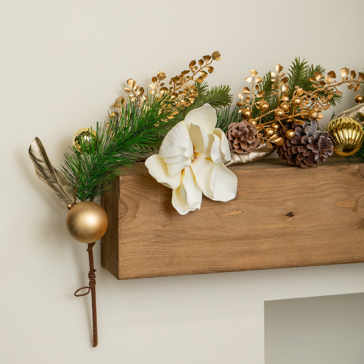 1.8m Champagne Magnolia Decorated Christmas Garland with Gold Baubles