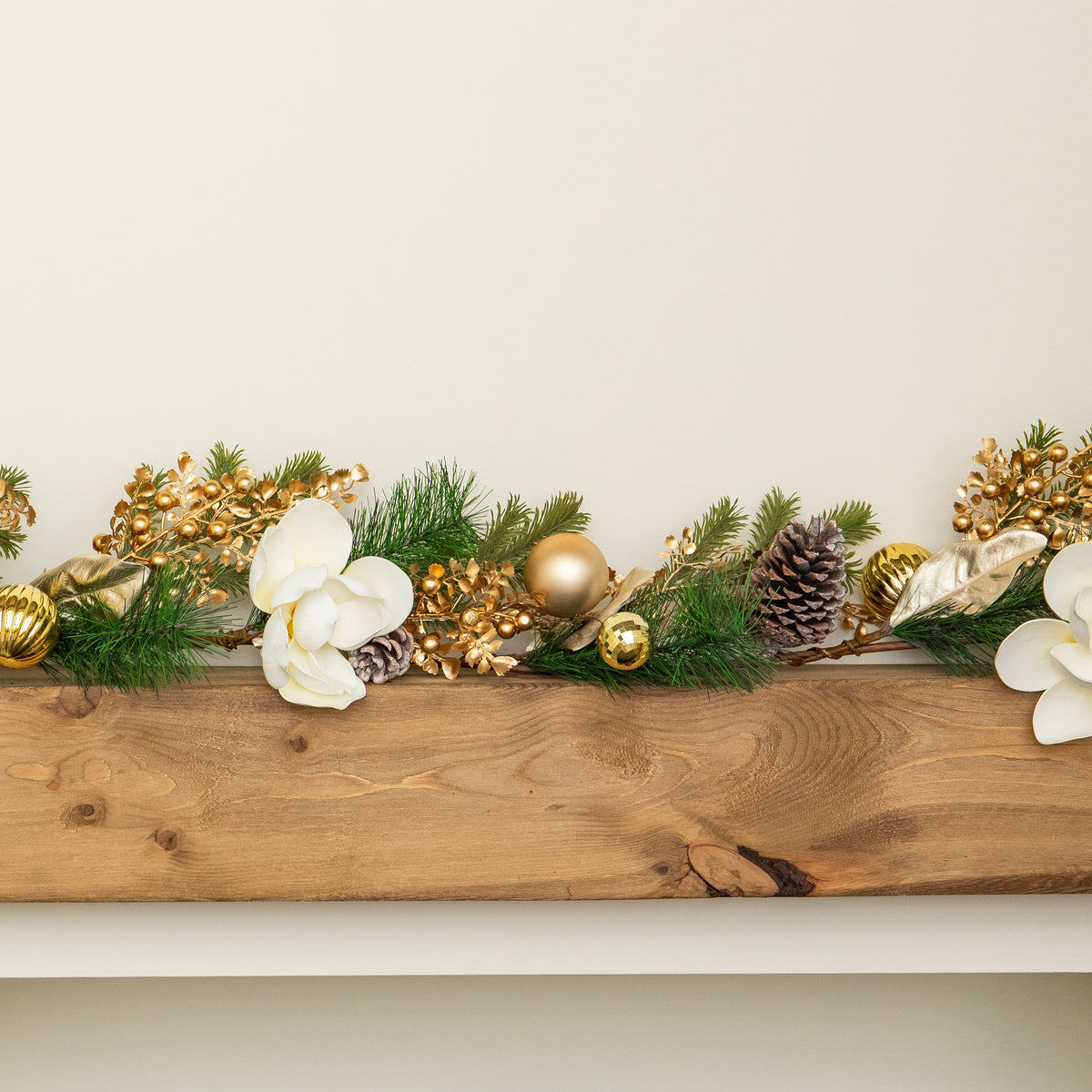 1.8m Champagne Magnolia Decorated Christmas Garland with Gold Baubles