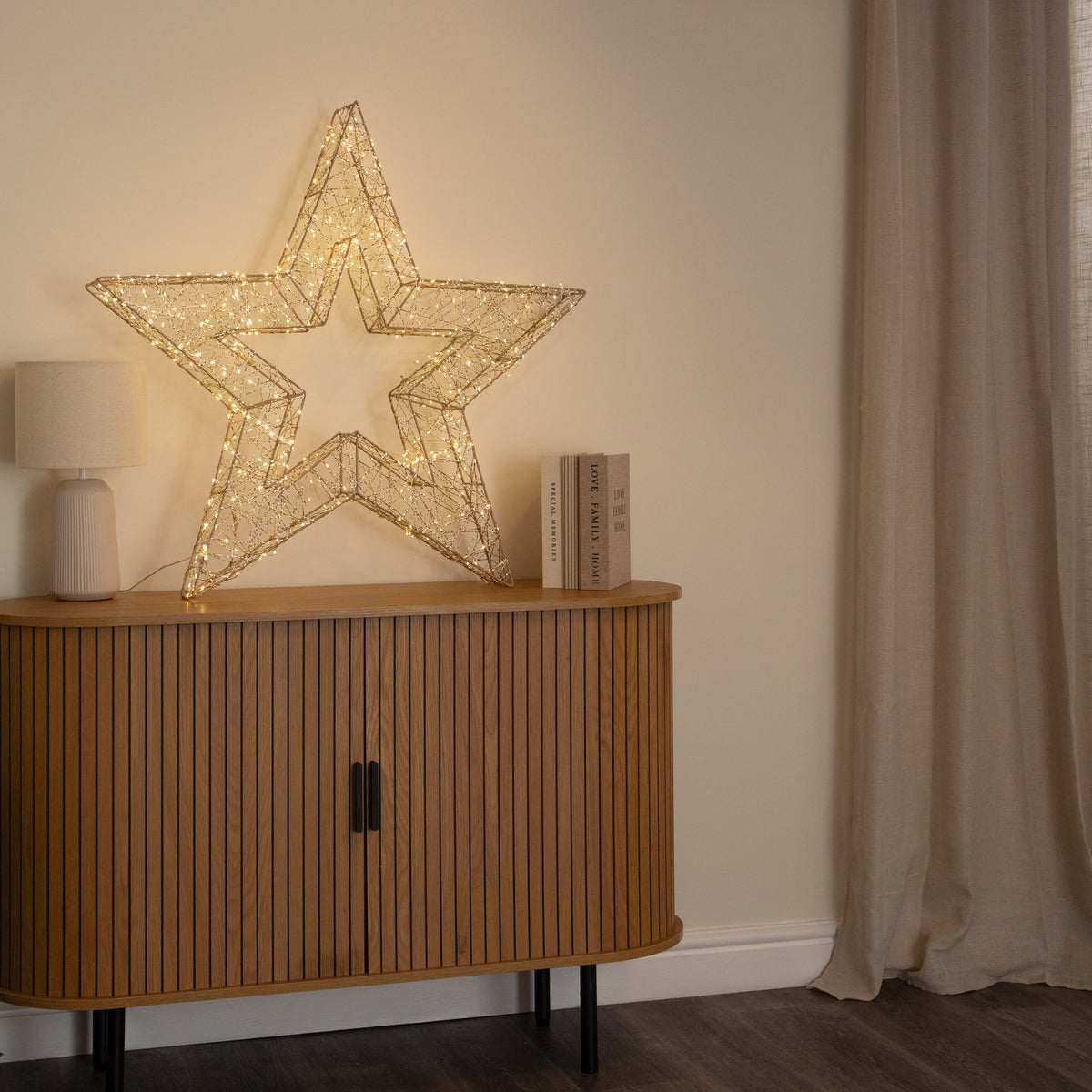 90cm Light up Gold Twist Christmas Star 540 Warm White LEDs