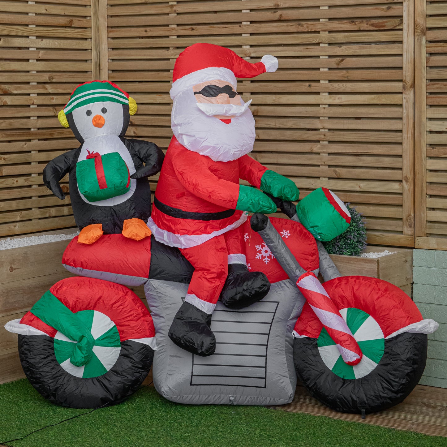 1.8m (6ft) Light up Santa with Penguin on Motorbike Christmas Inflatable with LEDs