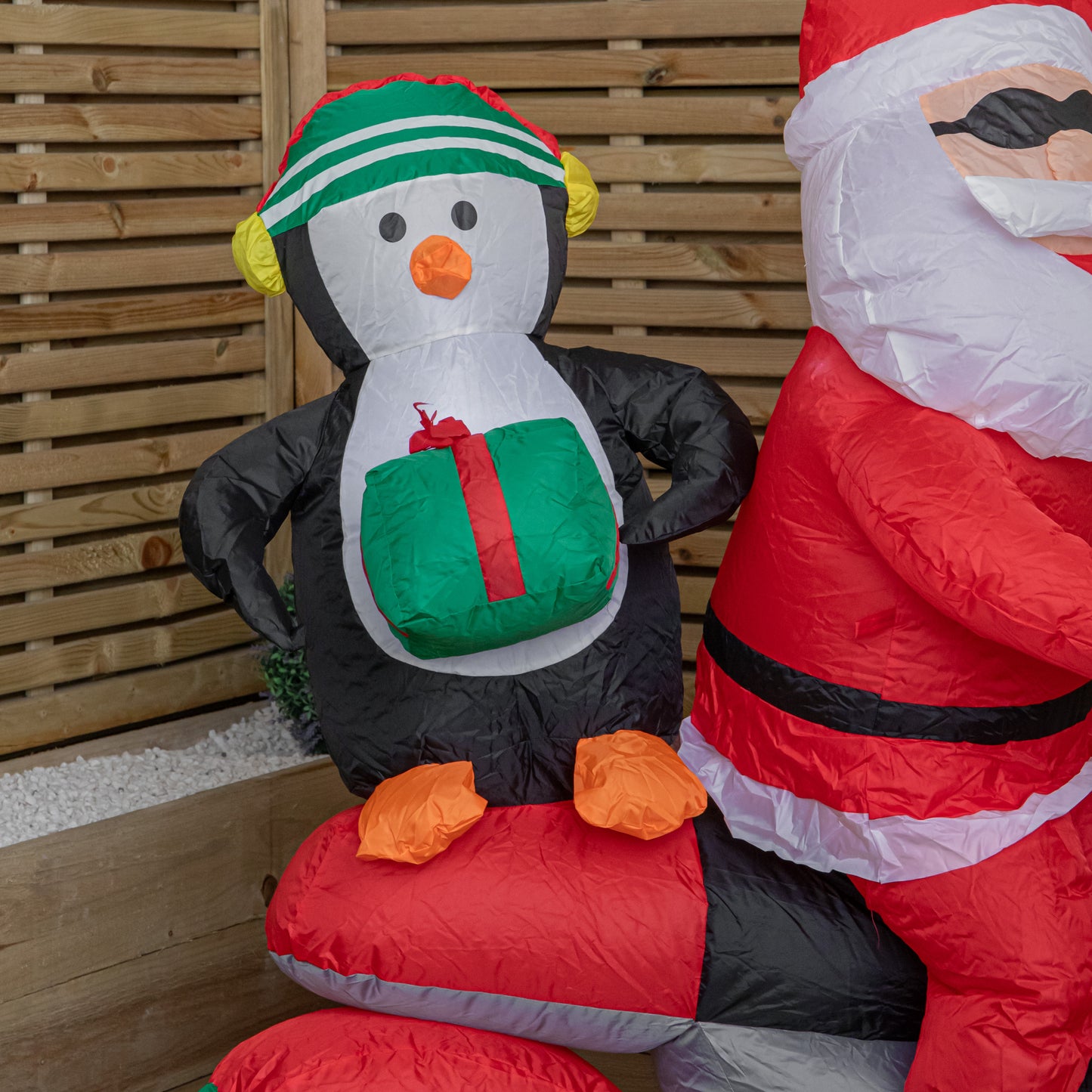1.8m (6ft) Light up Santa with Penguin on Motorbike Christmas Inflatable with LEDs