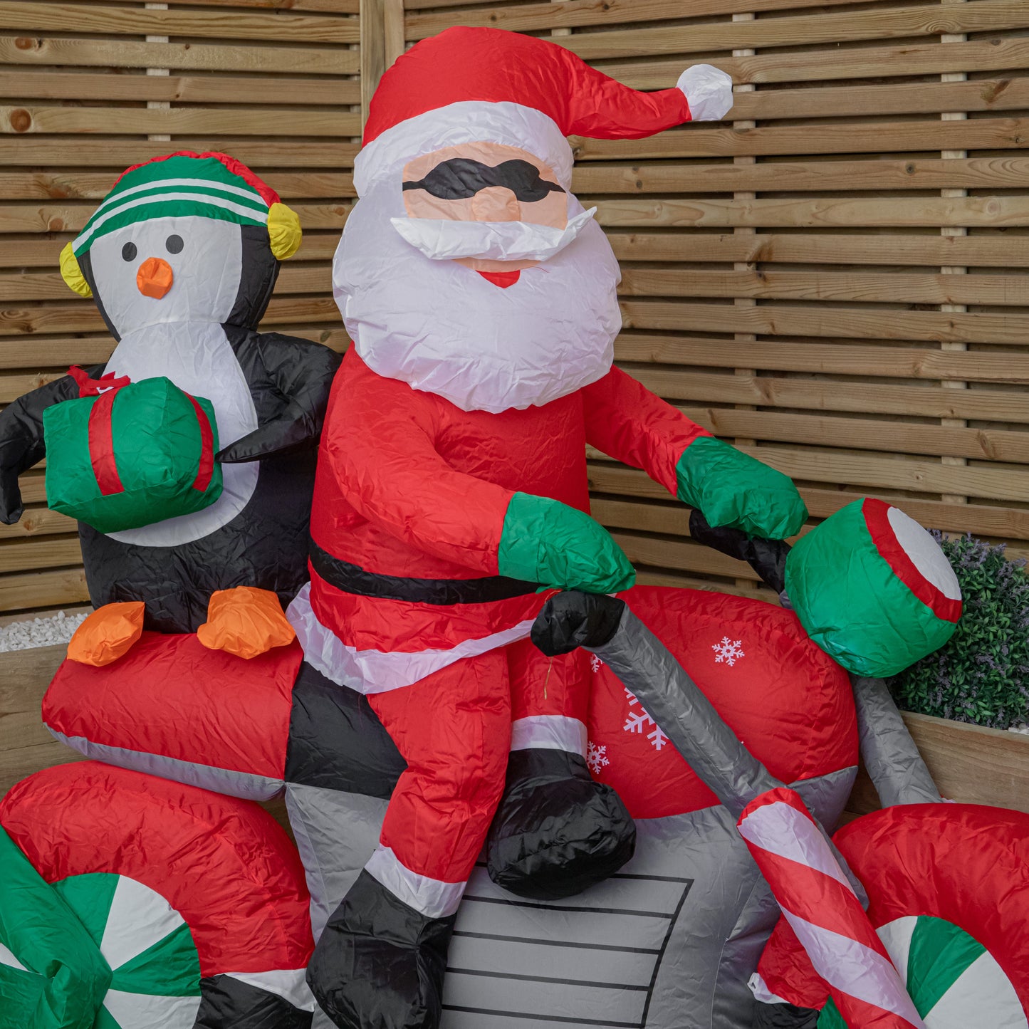 1.8m (6ft) Light up Santa with Penguin on Motorbike Christmas Inflatable with LEDs