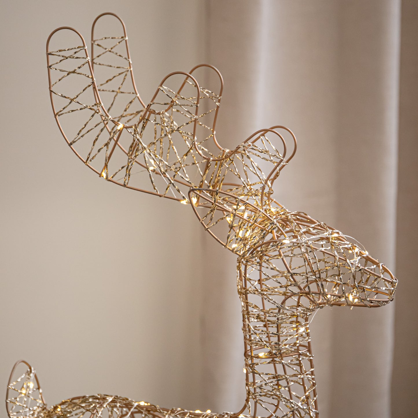 74cm Battery Powered Light up Gold Twist Christmas Standing Reindeer with 100 Warm White LEDs