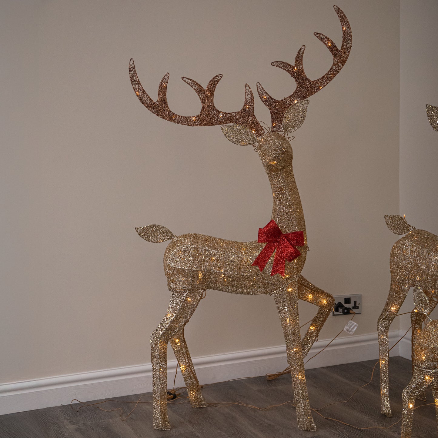 Set of 3 Gold Glitter Light Up Reindeer Family with 210 Warm White LEDs & Timer