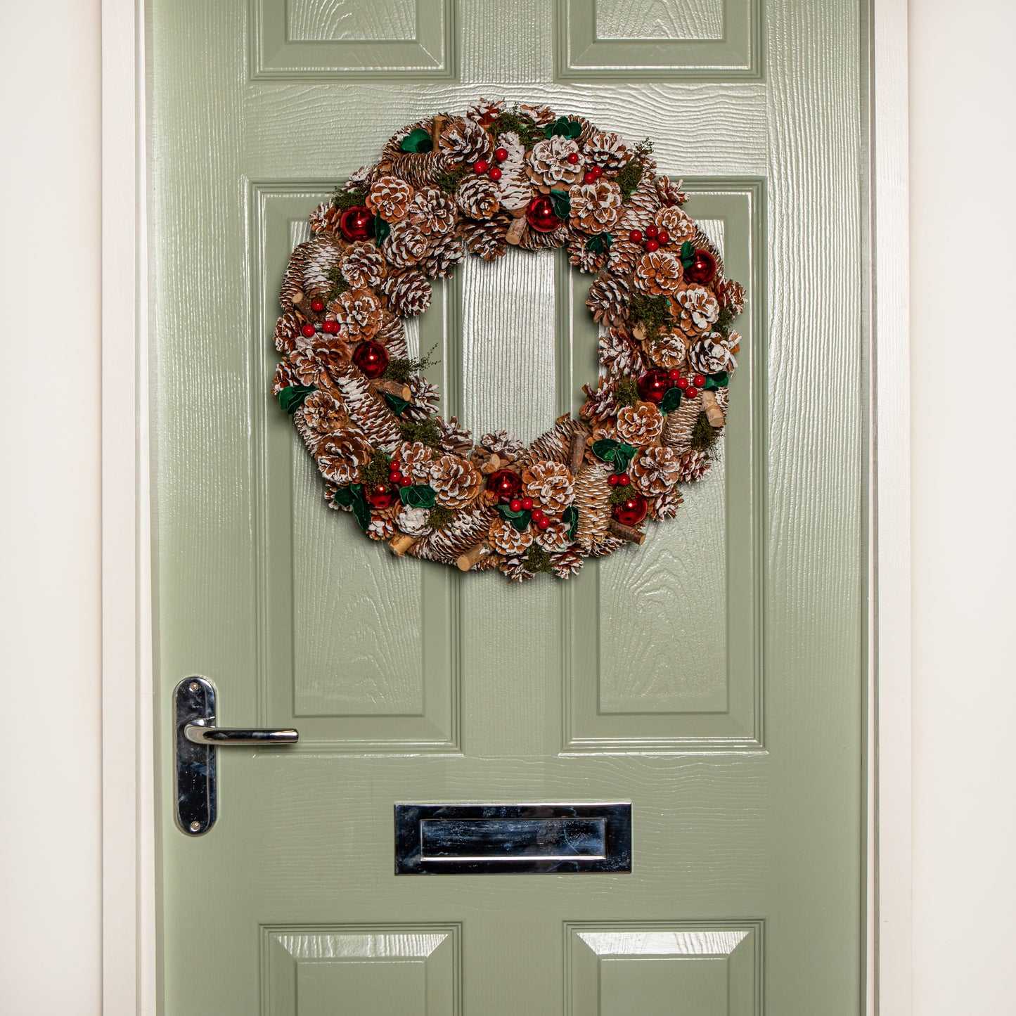 50cm Hanging Christmas YuleFest Wreath with Red Baubles & Snow Tipped Pine Cones