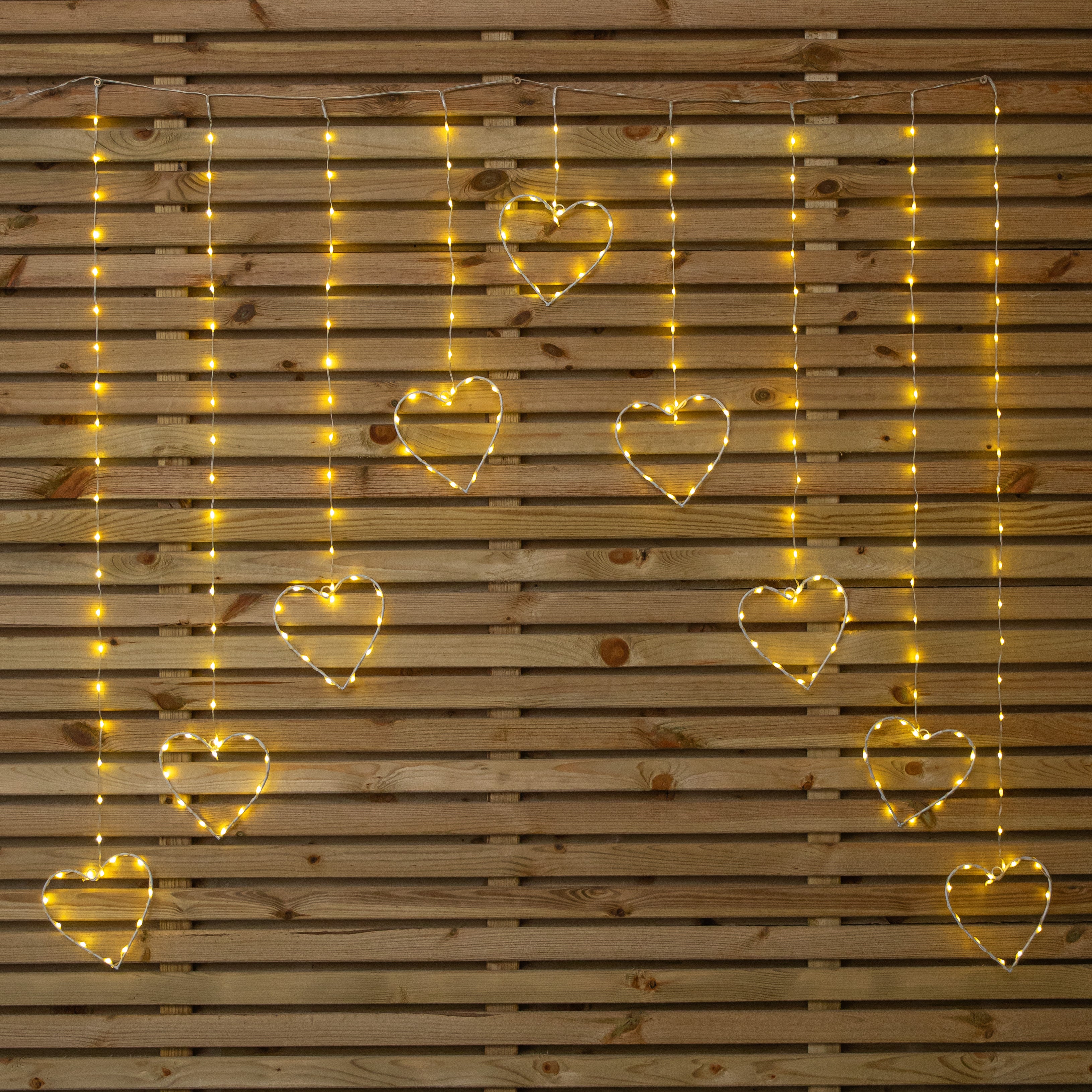 1.2 x 1.2m Light up Christmas Heart Curtain Lights with 229 Warm White LEDs