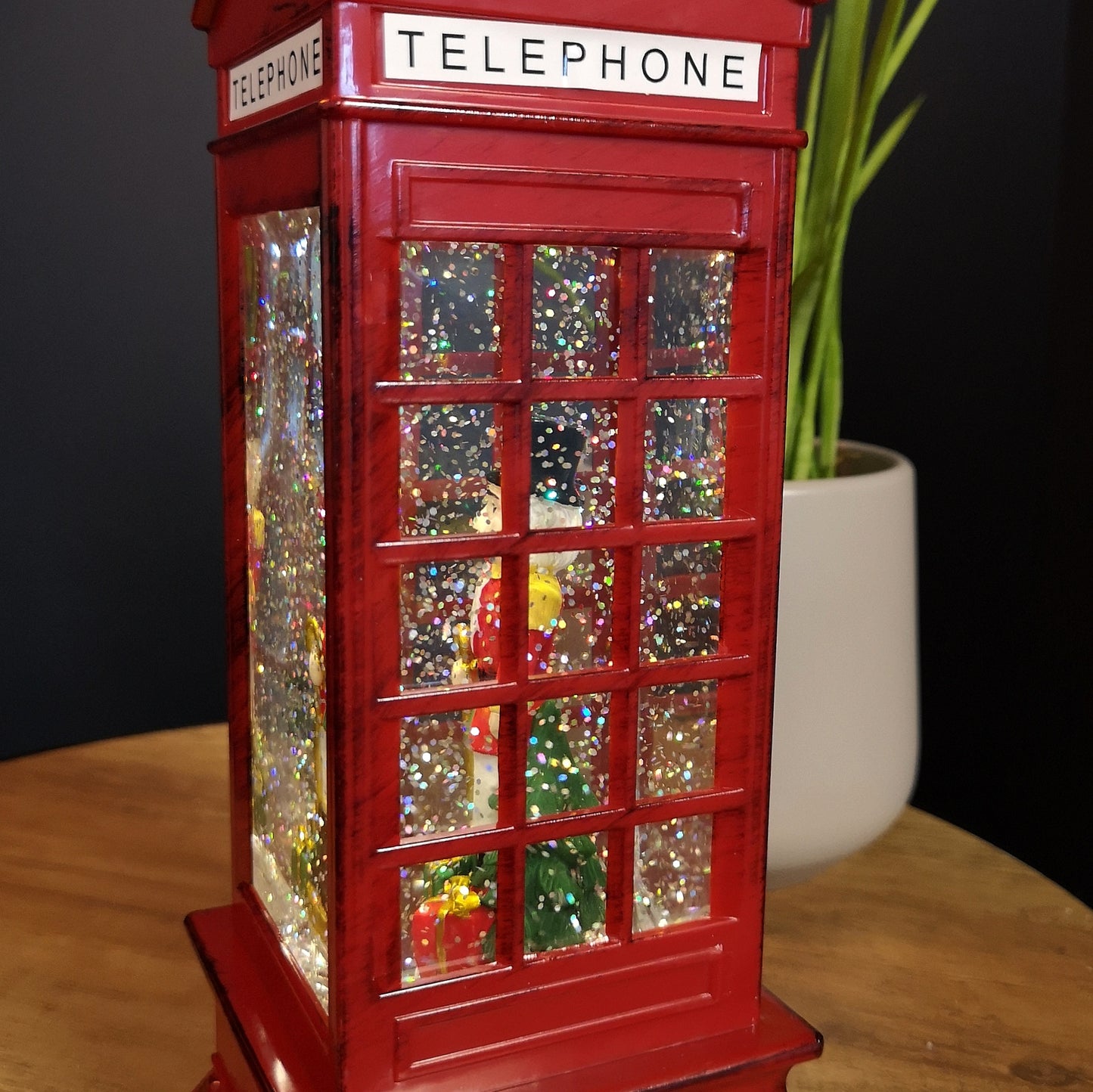 27cm LED Christmas Glitter Water Spinner Red Telephone Box with Nutcracker Scene