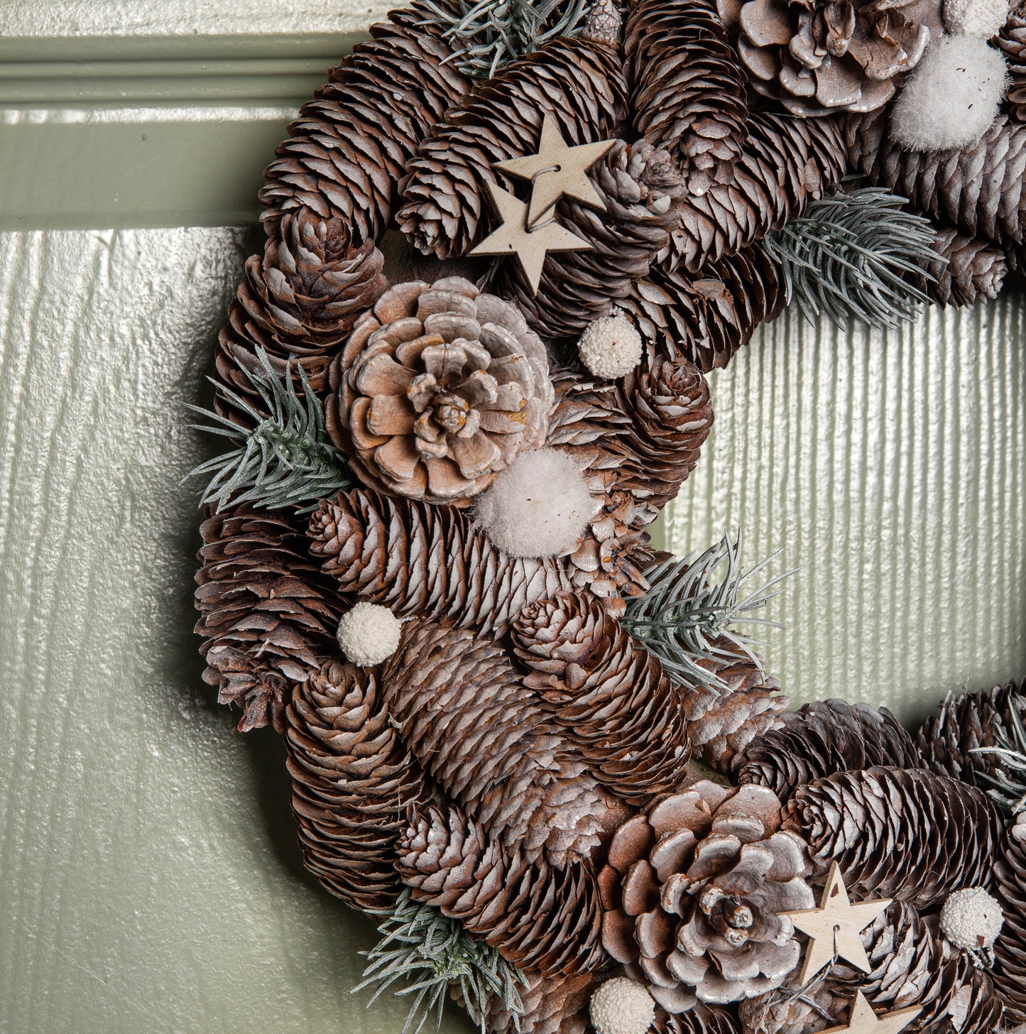 36cm Frosted Hanging Christmas Wreath with Pine Cones & Wooden Stars