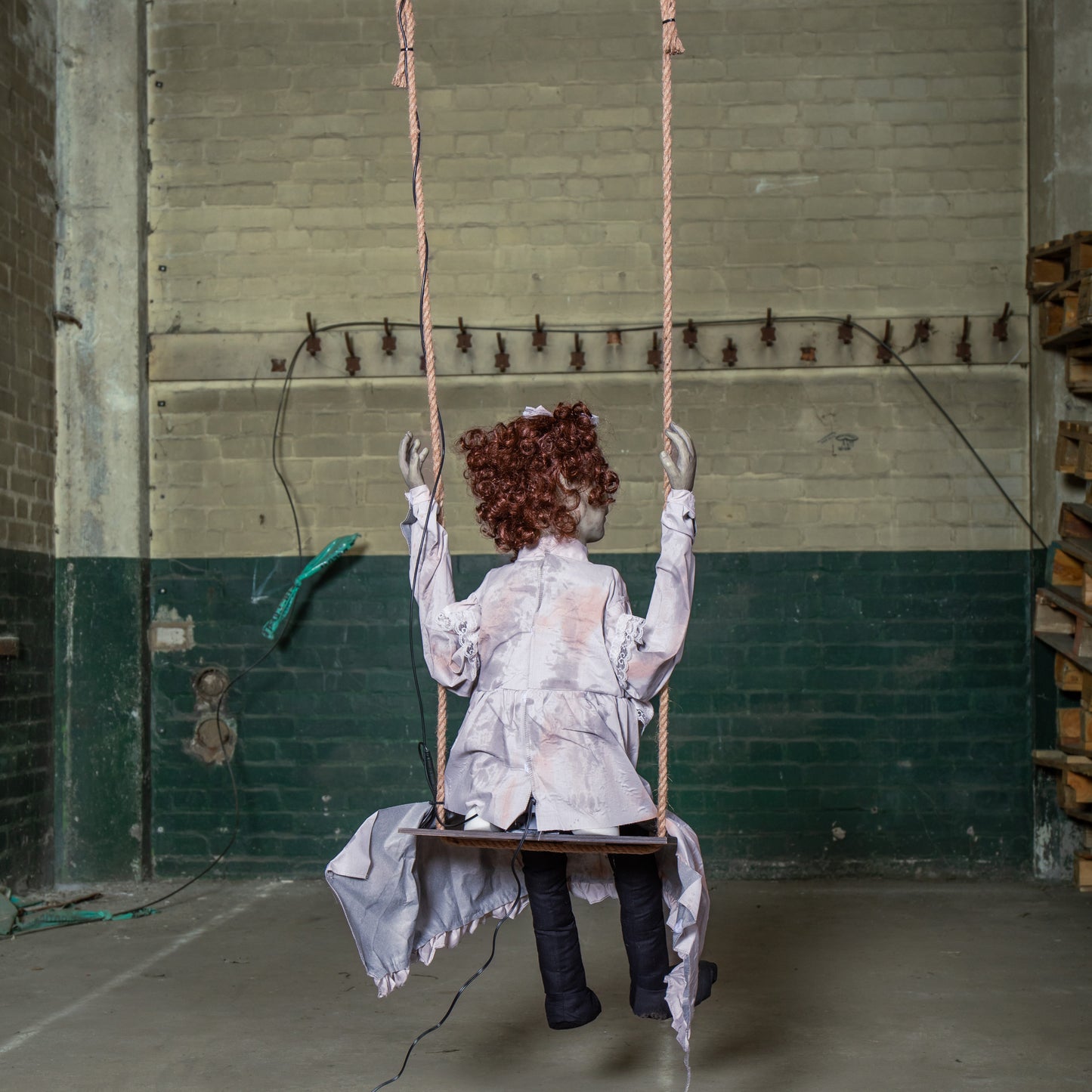 5.5ft Motion Activated Animated Swinging Decrepit Halloween Doll with LEDs