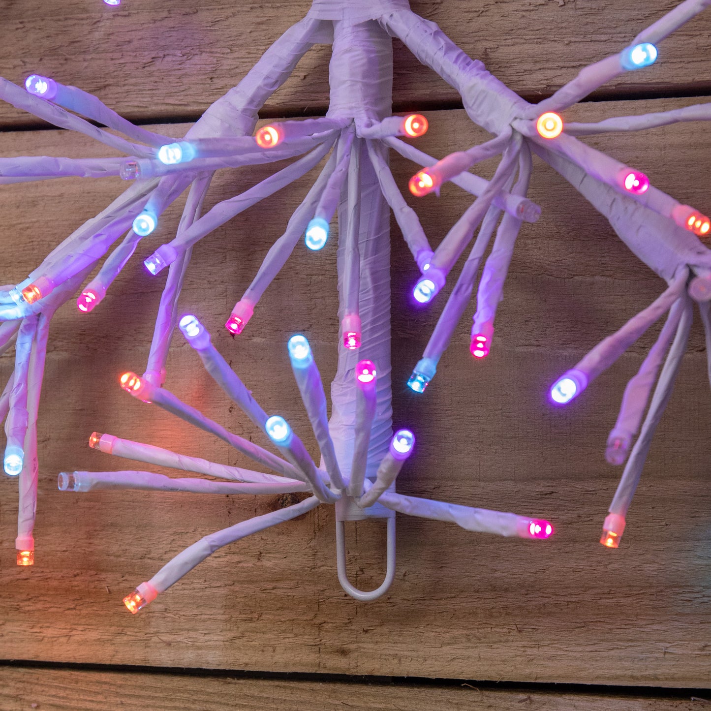 1.2m Twinkling Starburst Snowflake Christmas decoration with 960 Rainbow LEDs