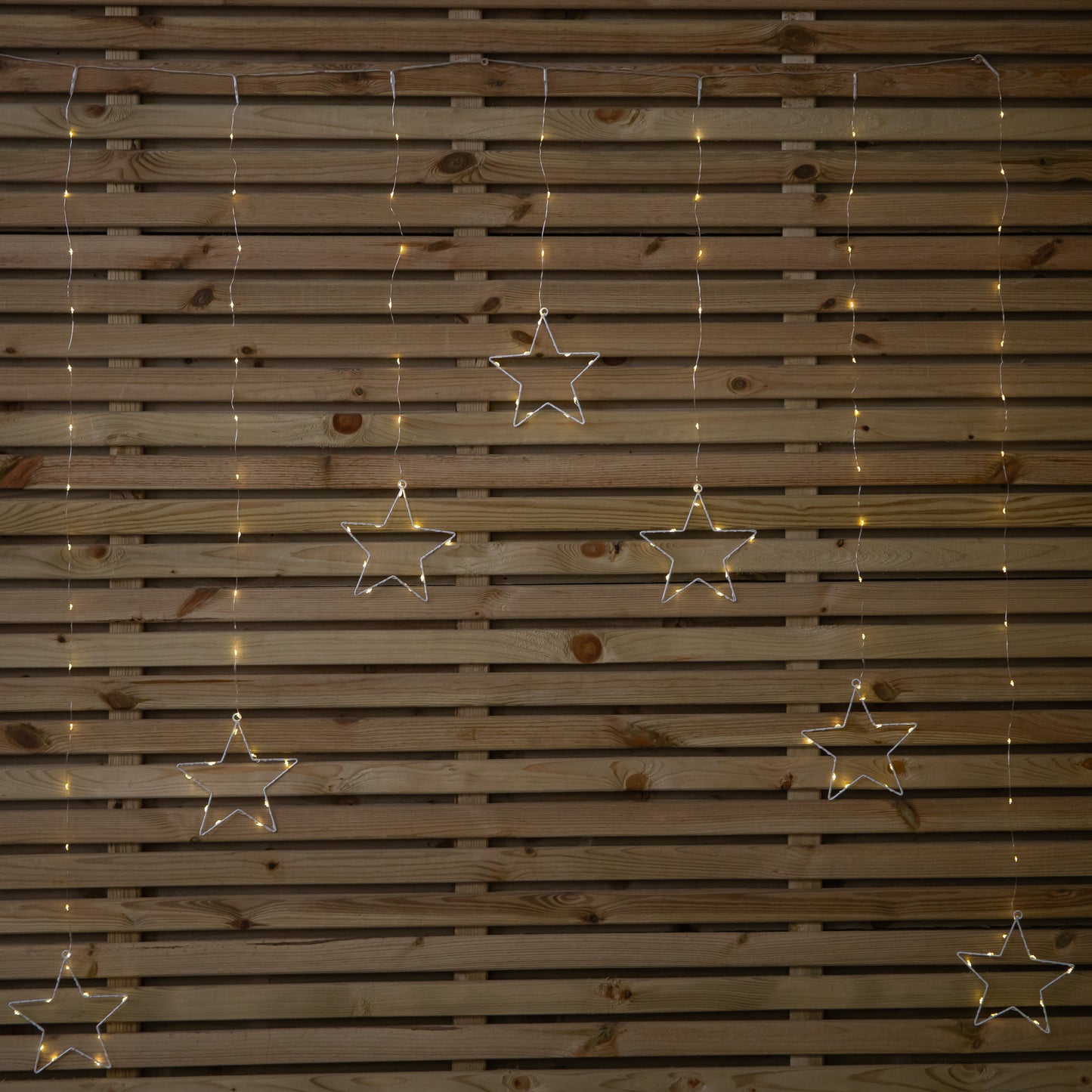 1.2m Battery Operated Star Christmas Curtain Lights with 140 Warm White LEDs