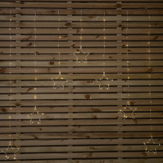 1.2m Battery Operated Star Christmas Curtain Lights with 140 Warm White LEDs
