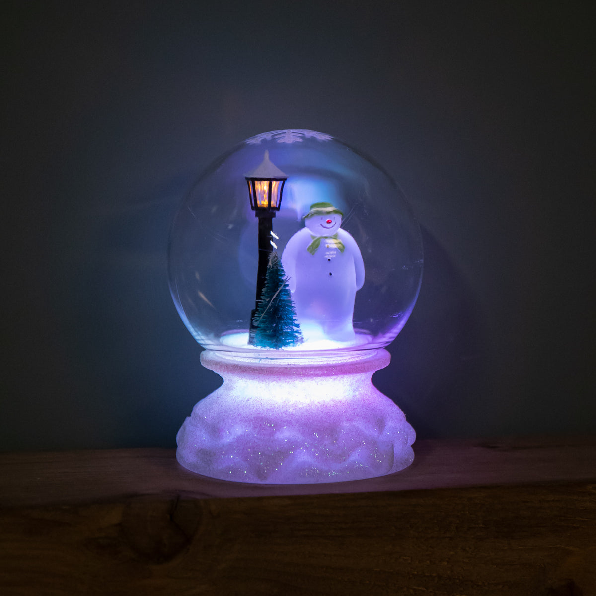 12cm Battery Operated Light up Christmas Snow Globe with The Snowman & Multi-Coloured LEDs