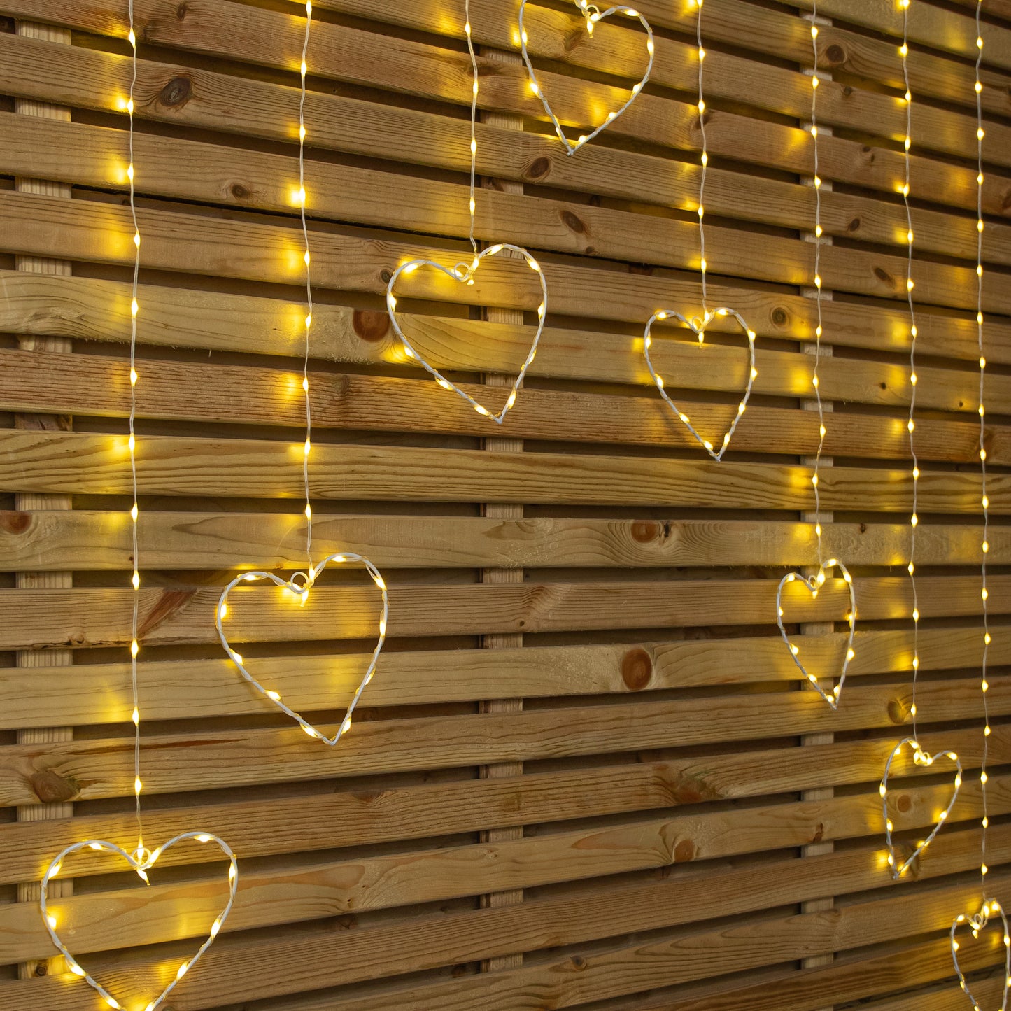 1.2 x 1.2m Light up Christmas Heart Curtain Lights with 229 Warm White LEDs