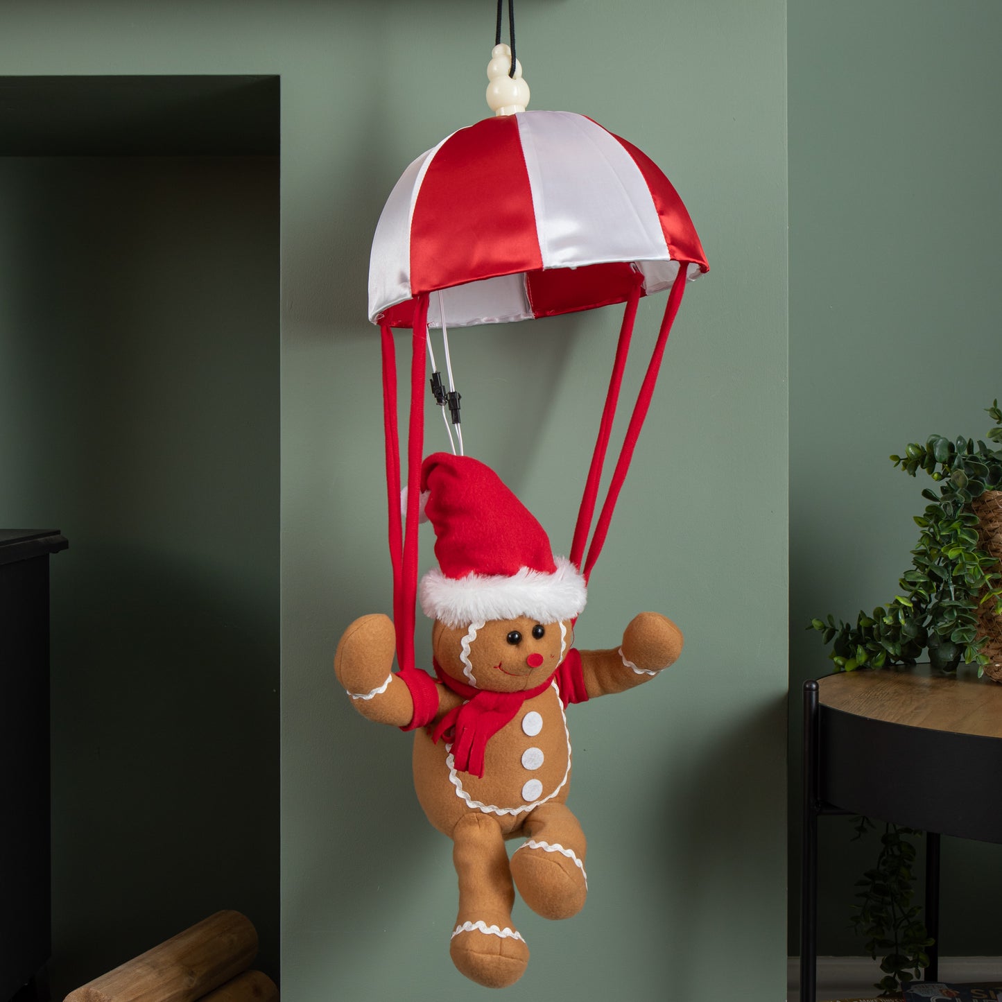 57cm Battery Operated Musical Parachuting Gingerbread Man with Leg Kicking Motion