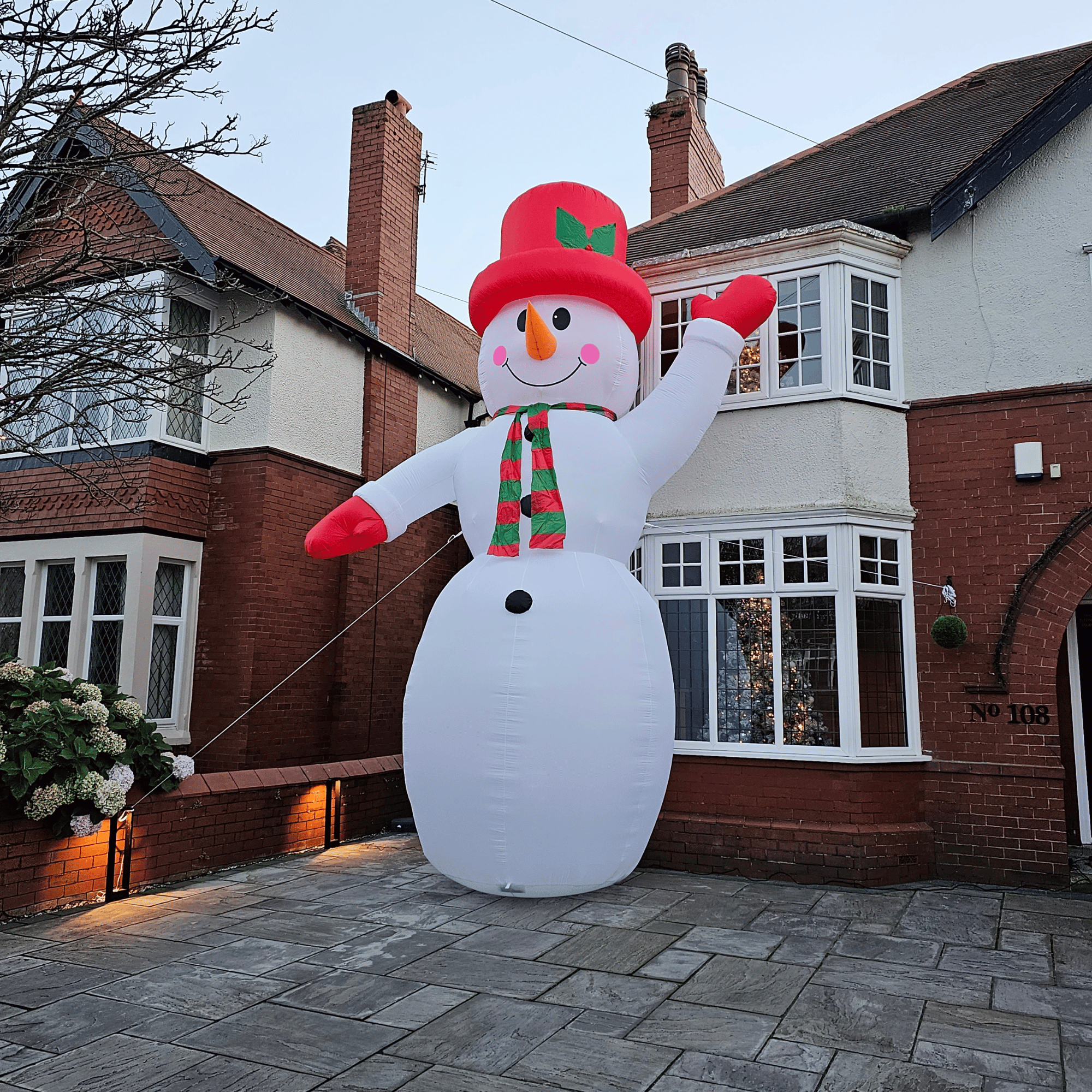 GIANT: 20ft (6m) Outdoor Inflatable Light up Christmas Snowman with Raised Arm with 28 LEDs