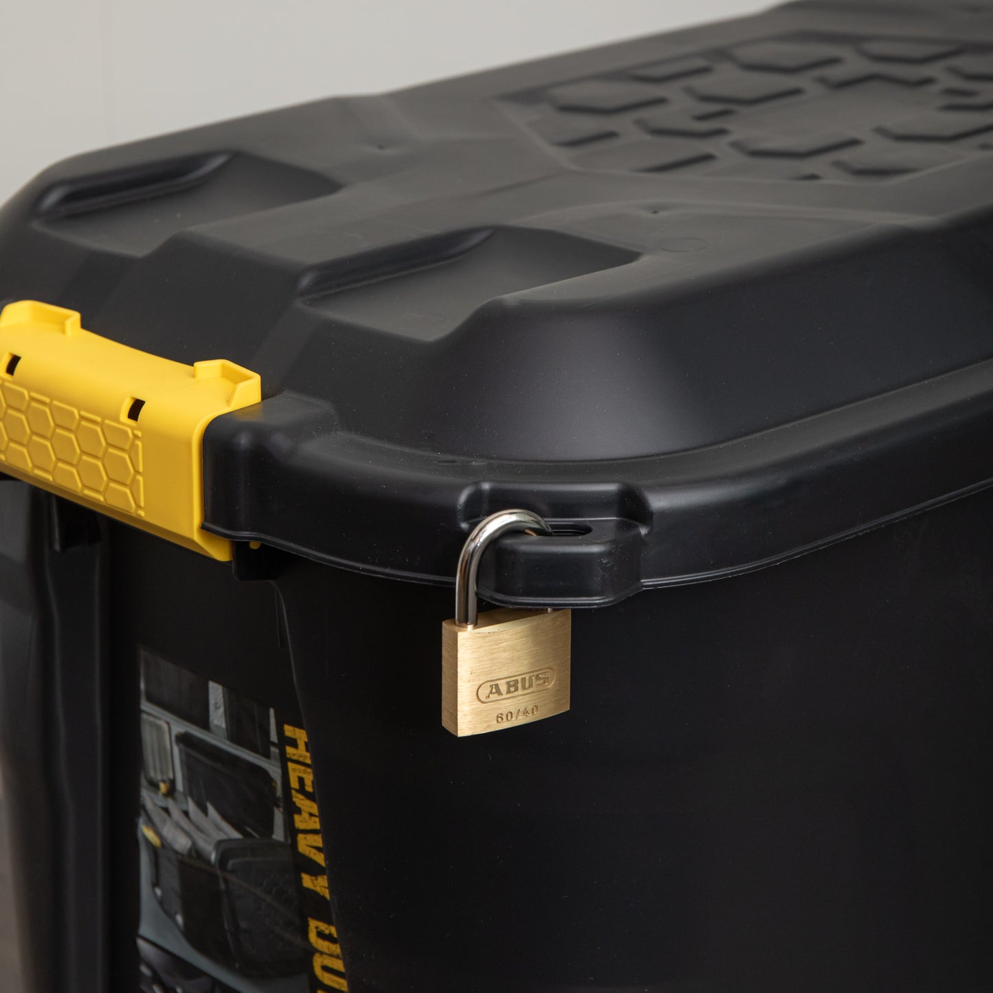 110L Heavy Duty Lockable, Stackable Storage Chest Trunk on Wheels with Clips in Black
