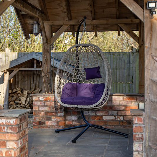 Samuel Alexander Hanging Garden Rattan Egg Chair with Steel Frame and Waterproof Cover in Indigo