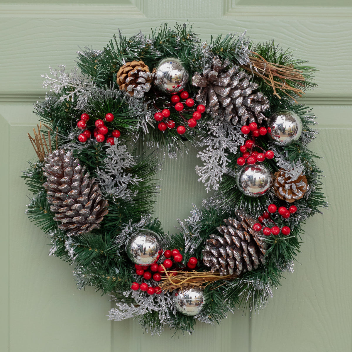 The Tree Company 40cm Festive Silver Dressed Christmas Wreath With Pinecones and Red Berries